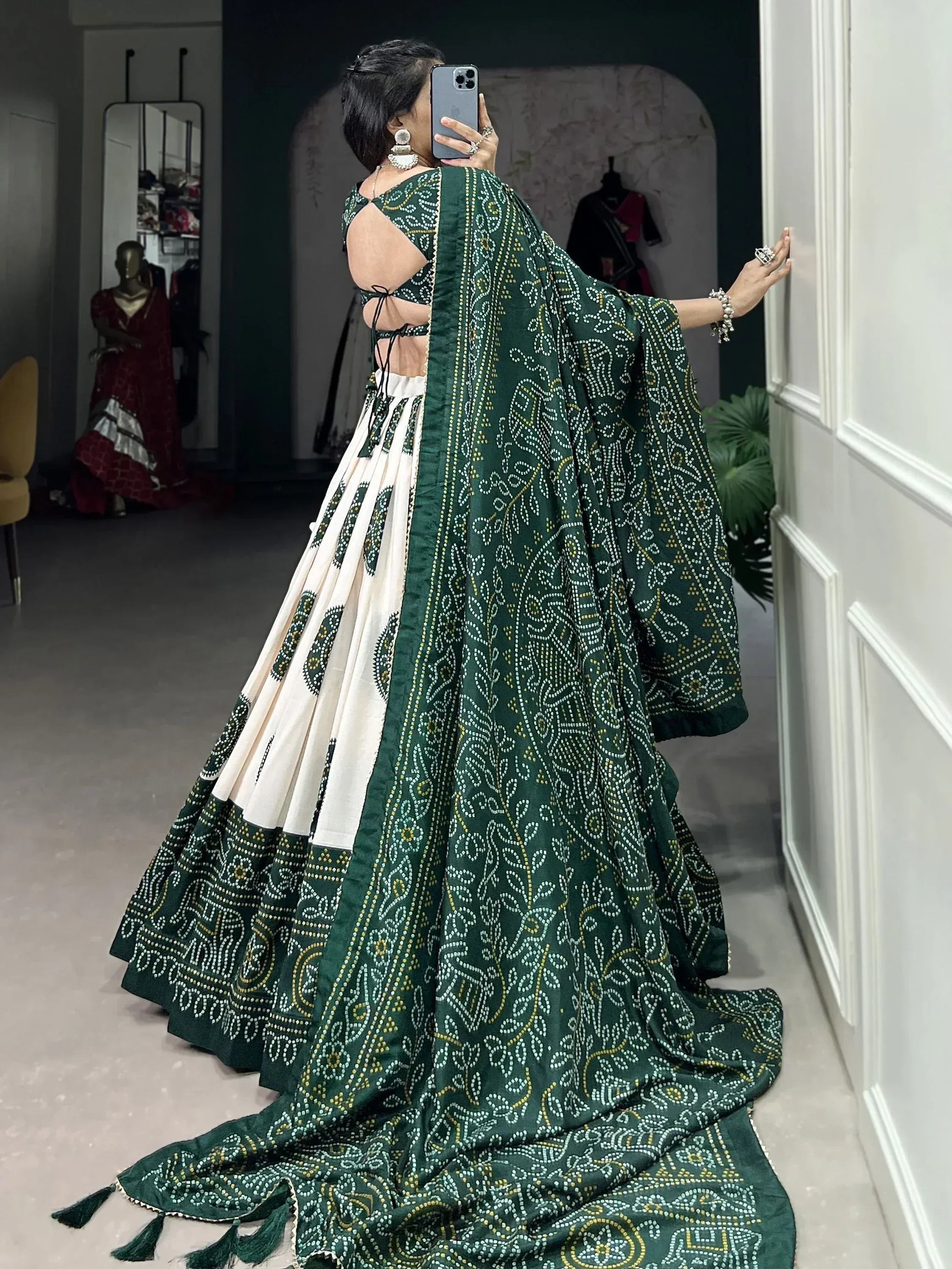 Green and white printed lehenga choli with back tie-up, perfect for Indian ethnic wear occasions