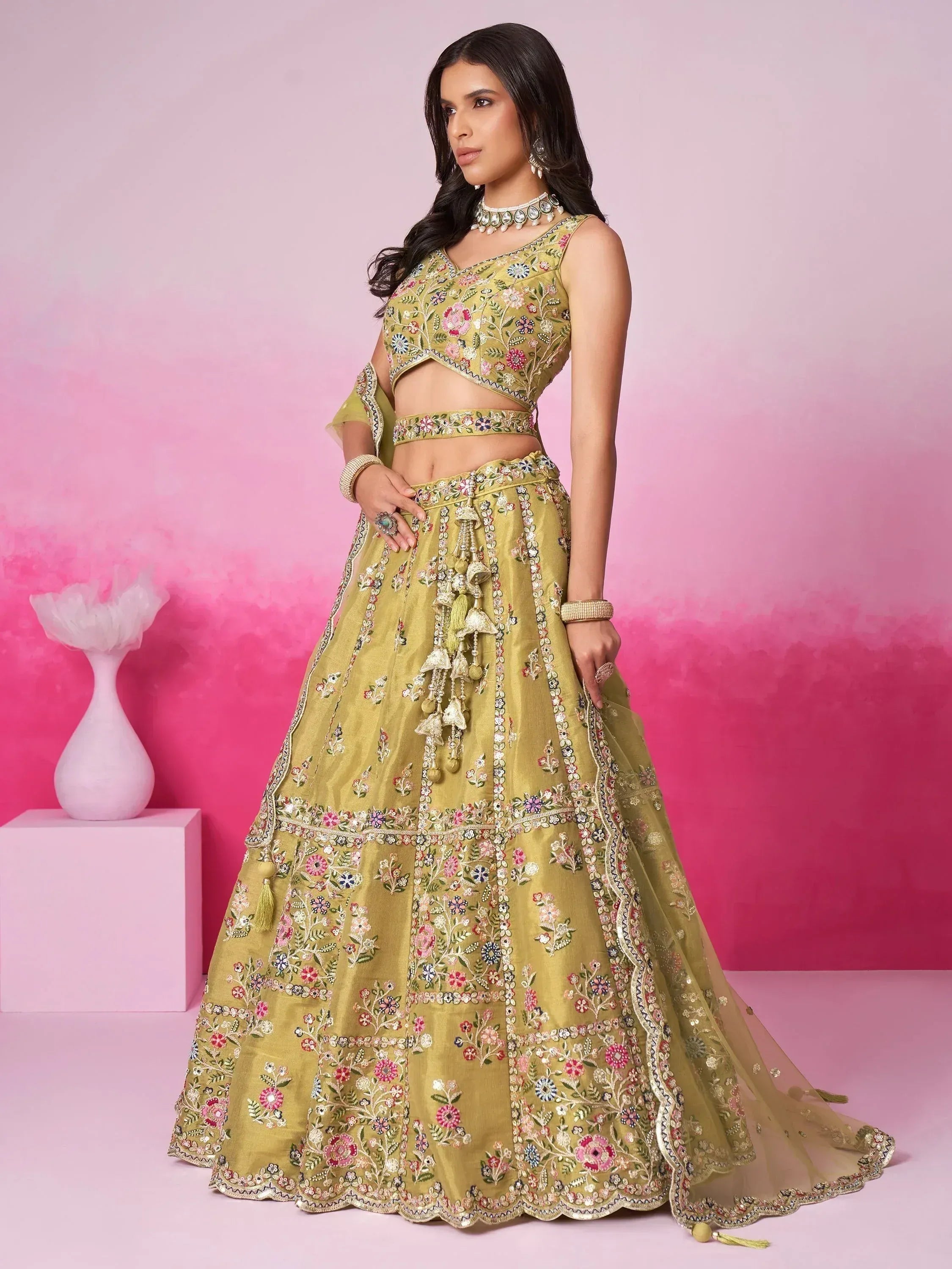 Olive green floral embroidered lehenga choli with tassels, perfect for Indian ethnic wear occasions