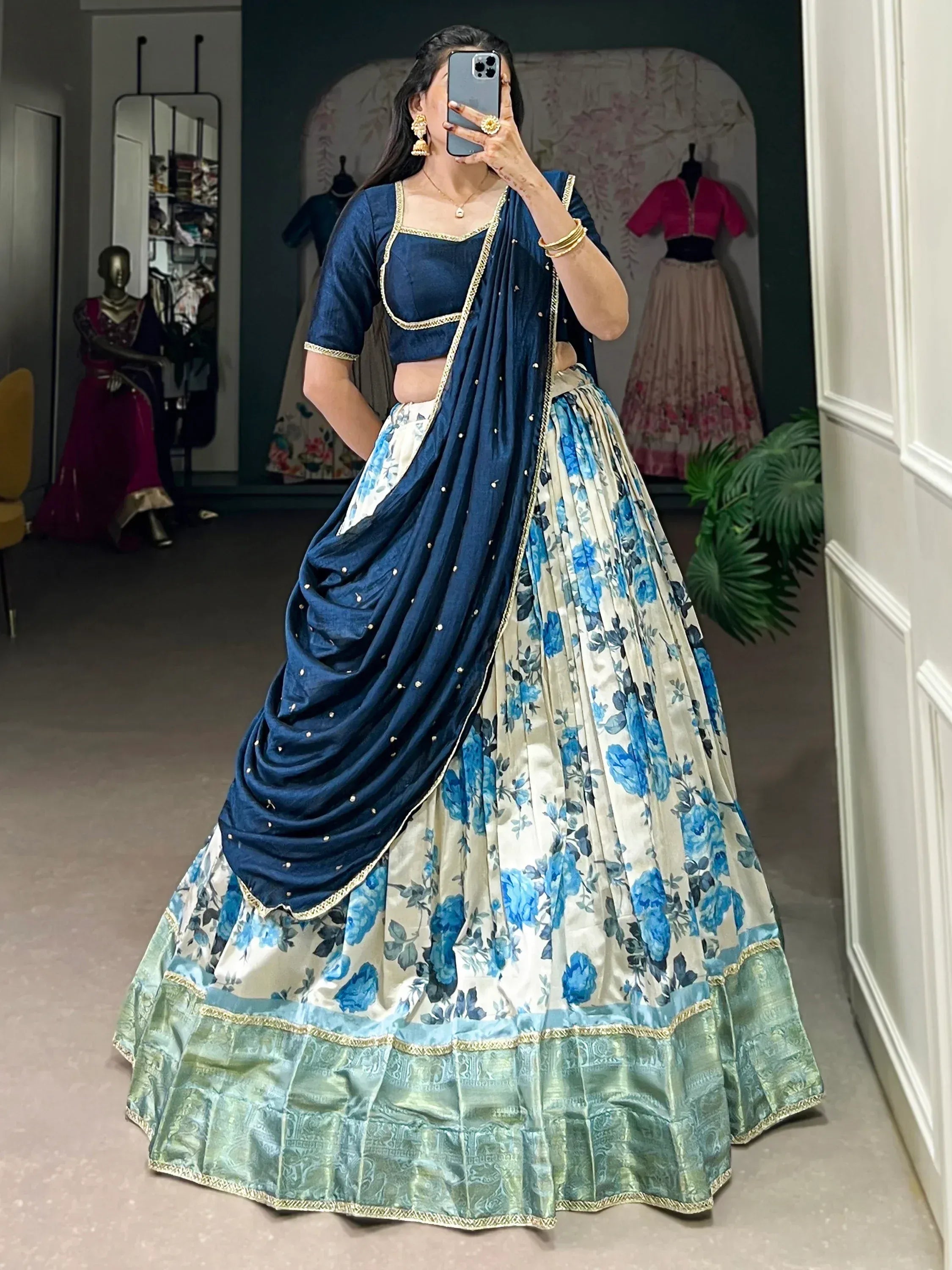 Blue floral lehenga choli with gold trim, perfect for Indian ethnic wear events