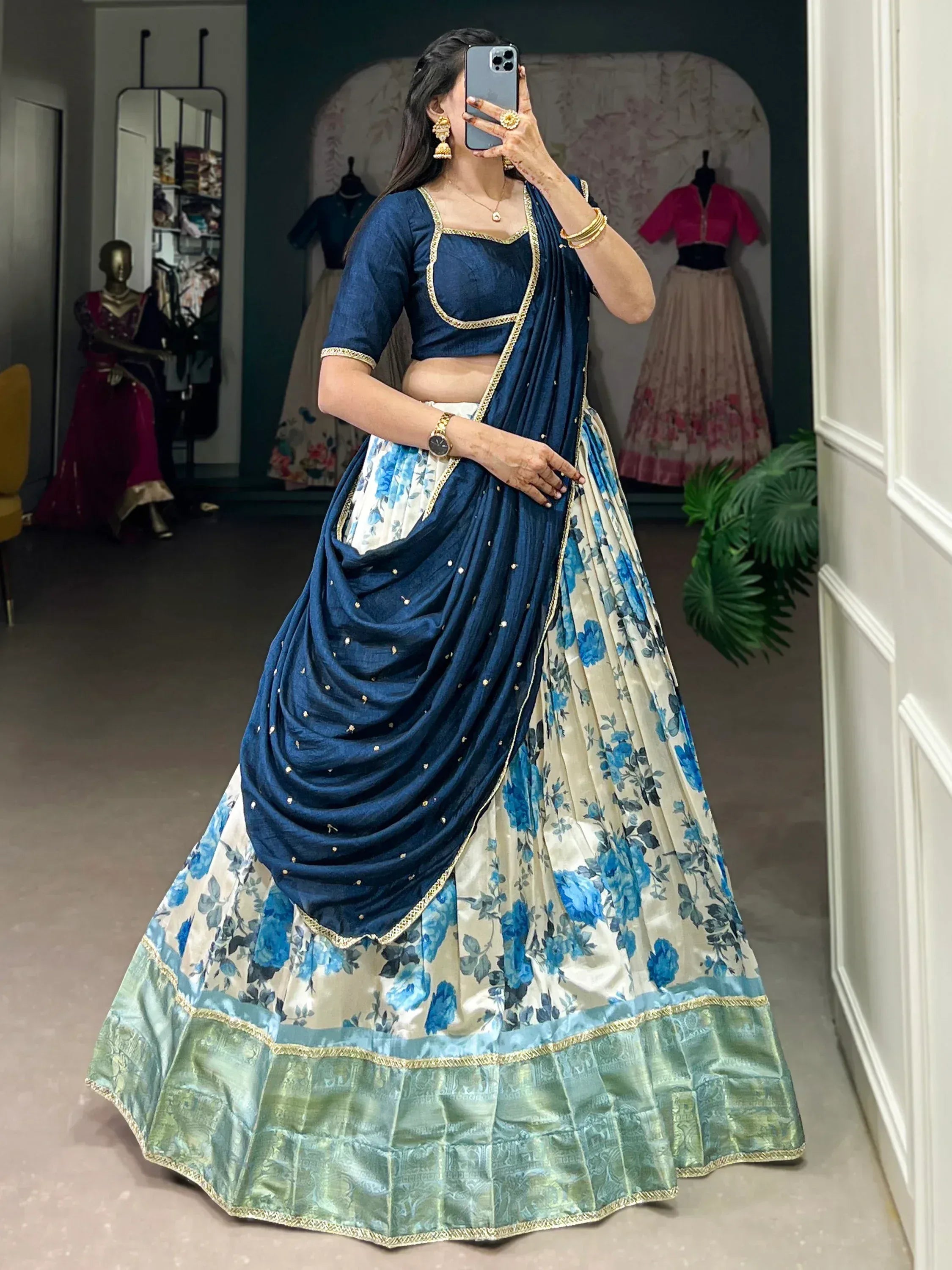 Blue floral lehenga choli with gold trim, perfect for Indian ethnic wear and designer occasions.