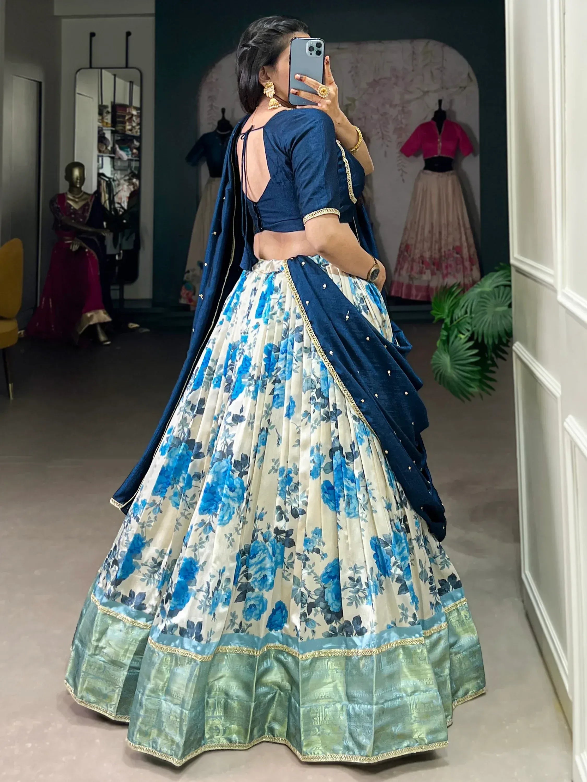 Blue floral lehenga choli with gold trim, back view, ethnic Indian wear