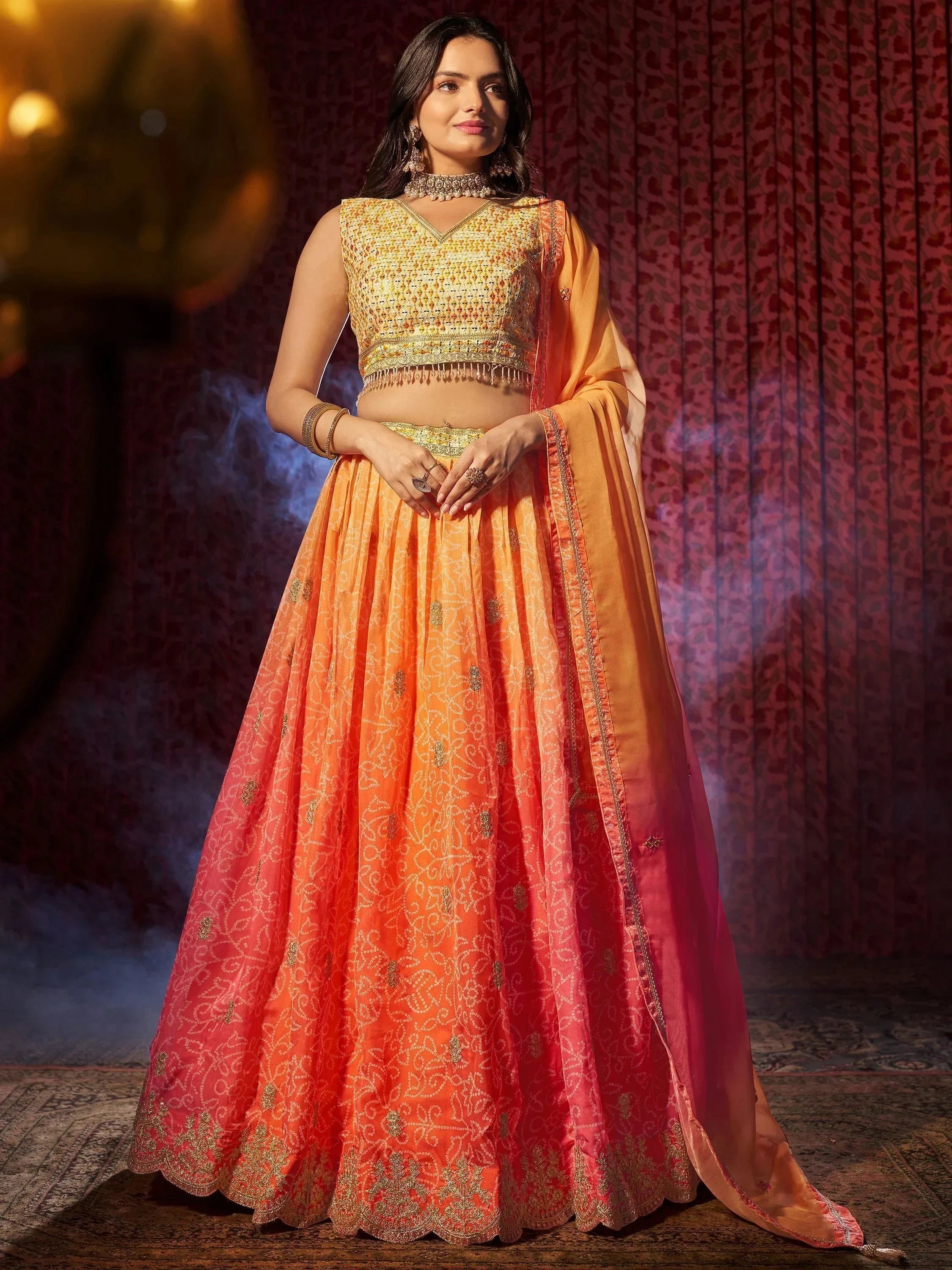 Orange and gold embroidered lehenga choli with dupatta, Indian ethnic wear for weddings and festivals