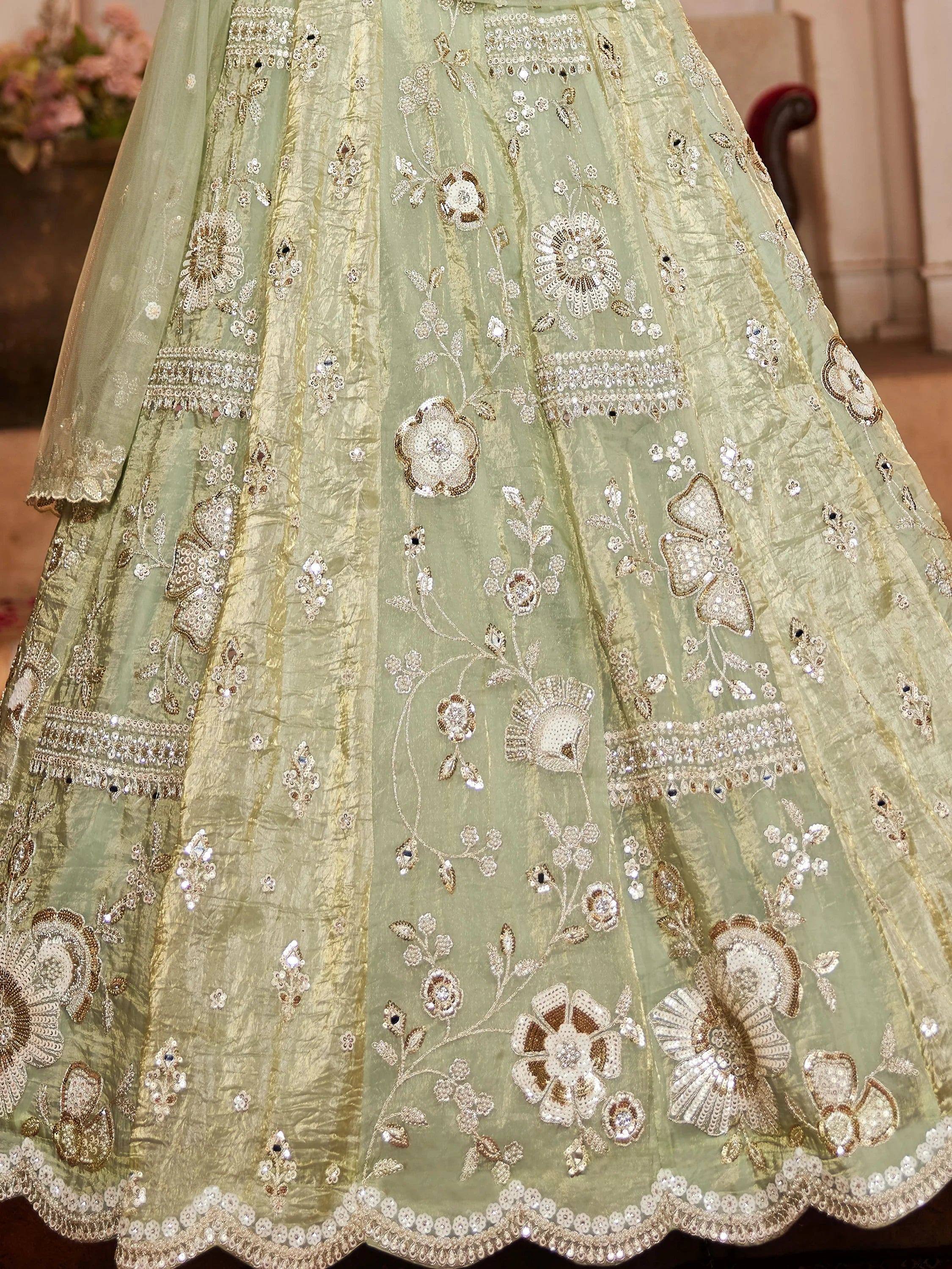 Mint green lehenga with gold floral embroidery and sequin detailing for Indian ethnic wear