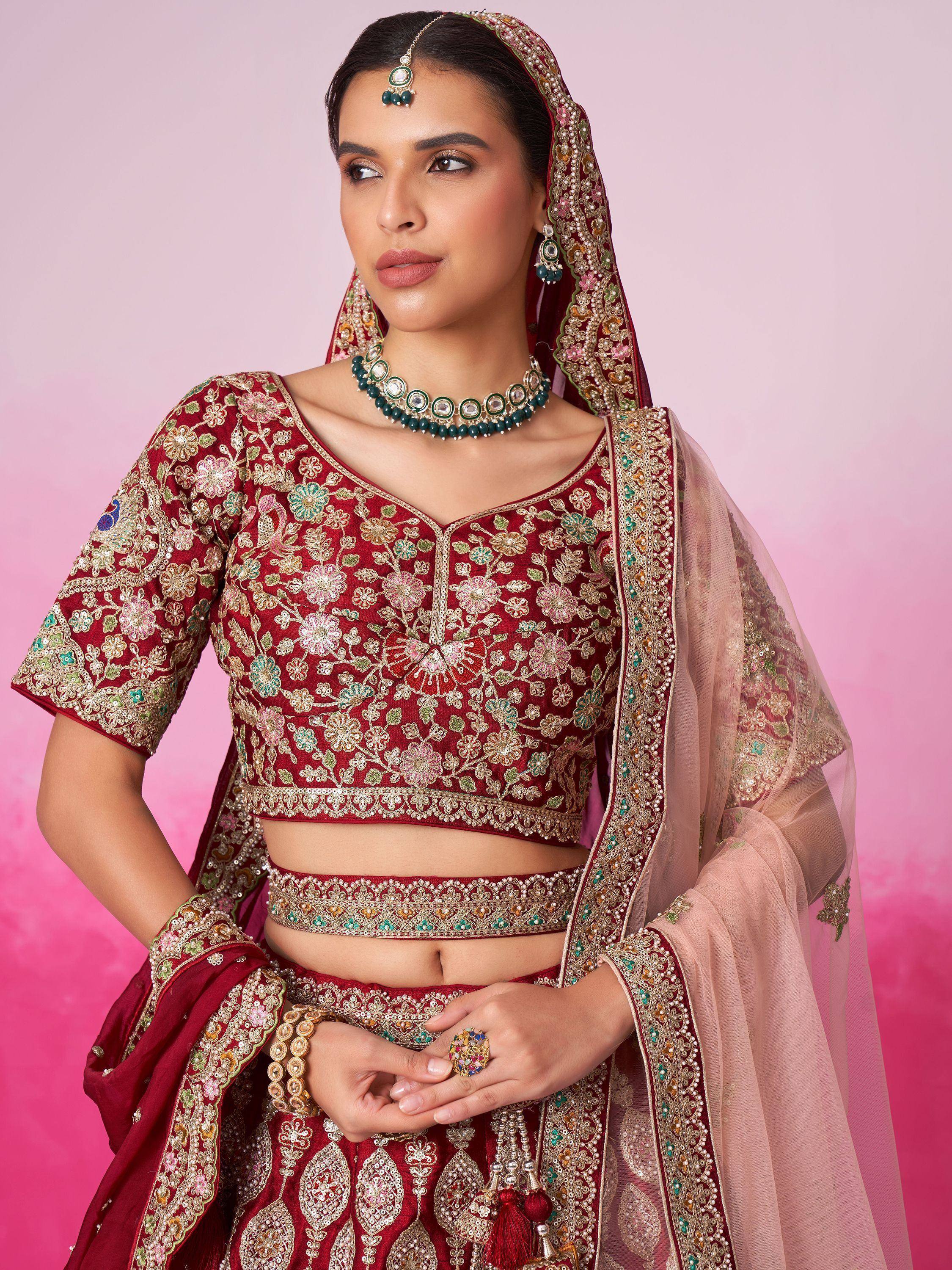 Elegant maroon lehenga choli with floral embroidery and matching dupatta for Indian ethnic wear