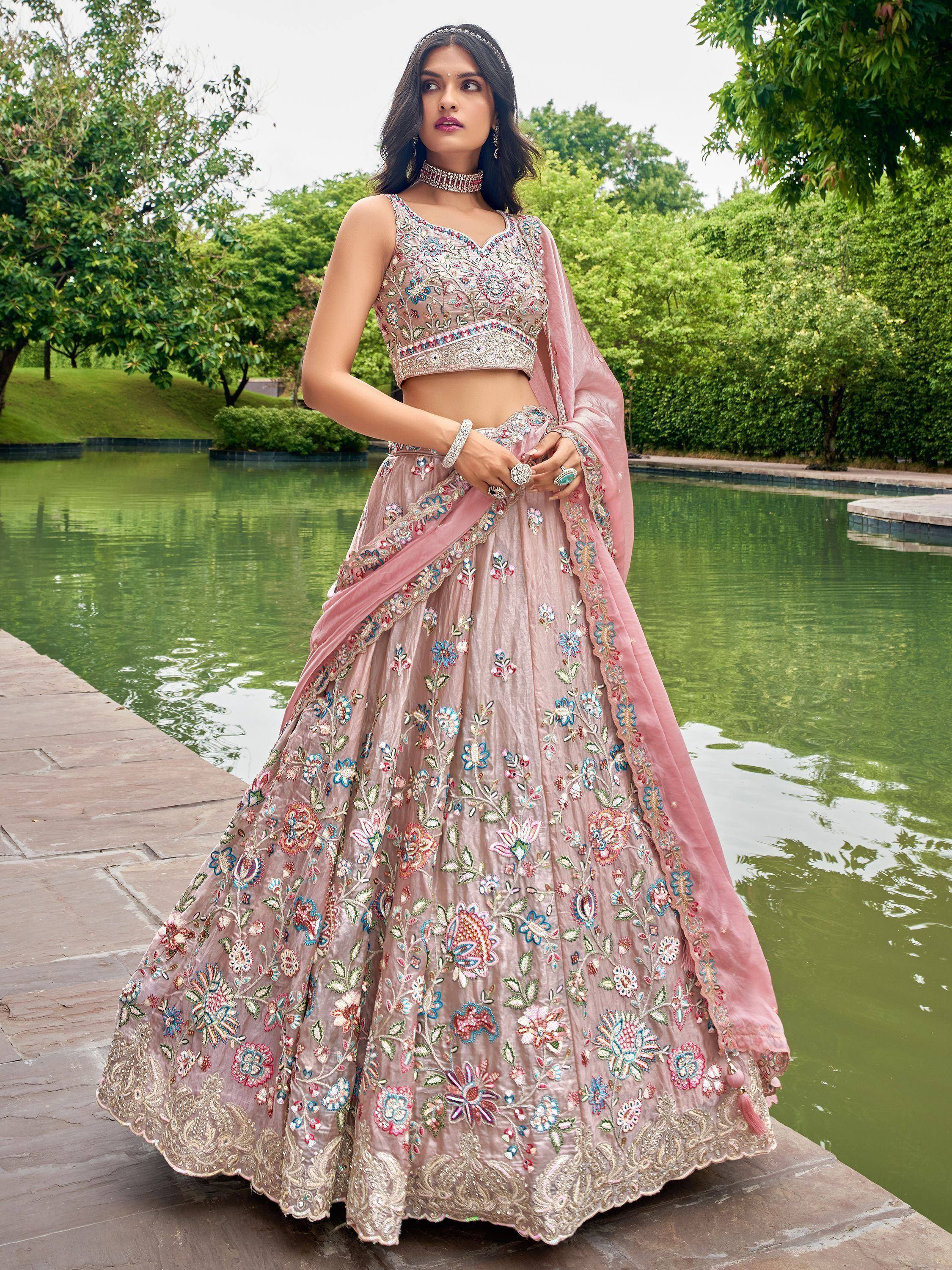 Pink floral embroidered lehenga choli with dupatta, perfect for Indian weddings and festive occasions
