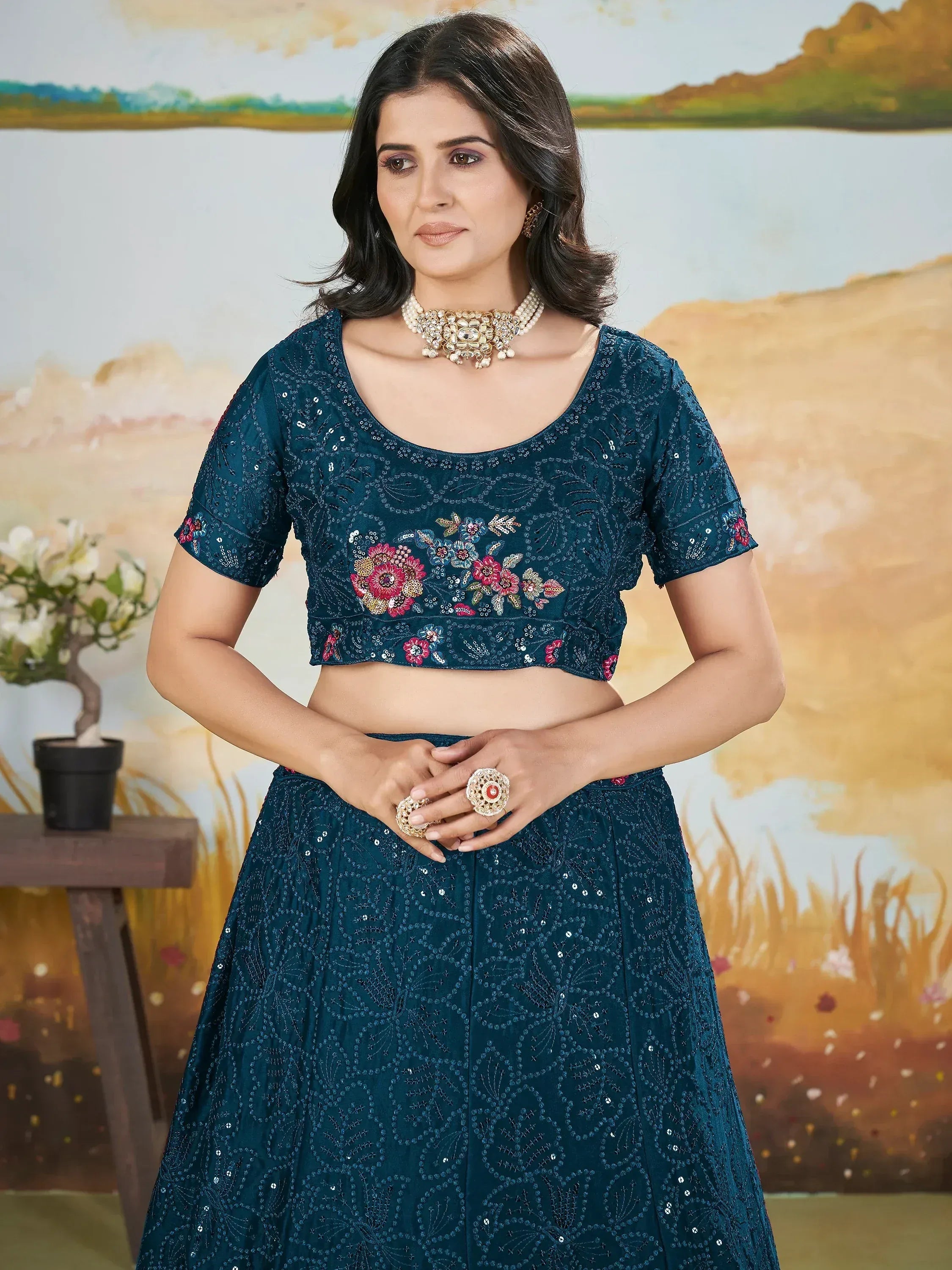 Teal embroidered lehenga choli with floral sequin work, perfect for Indian ethnic occasions
