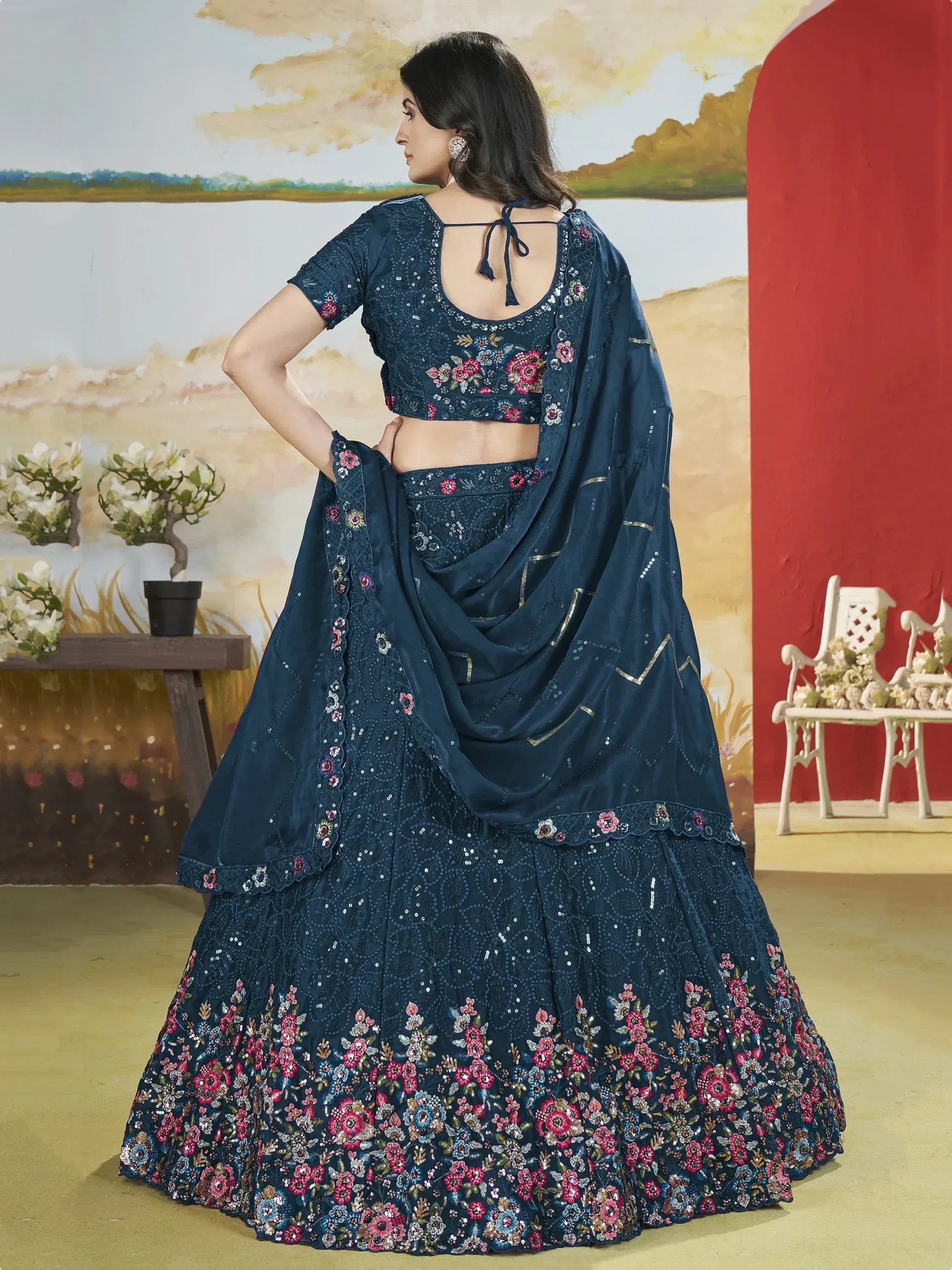 Navy blue floral embroidered lehenga choli with sequin work and back tie blouse, perfect for Indian ethnic occasions