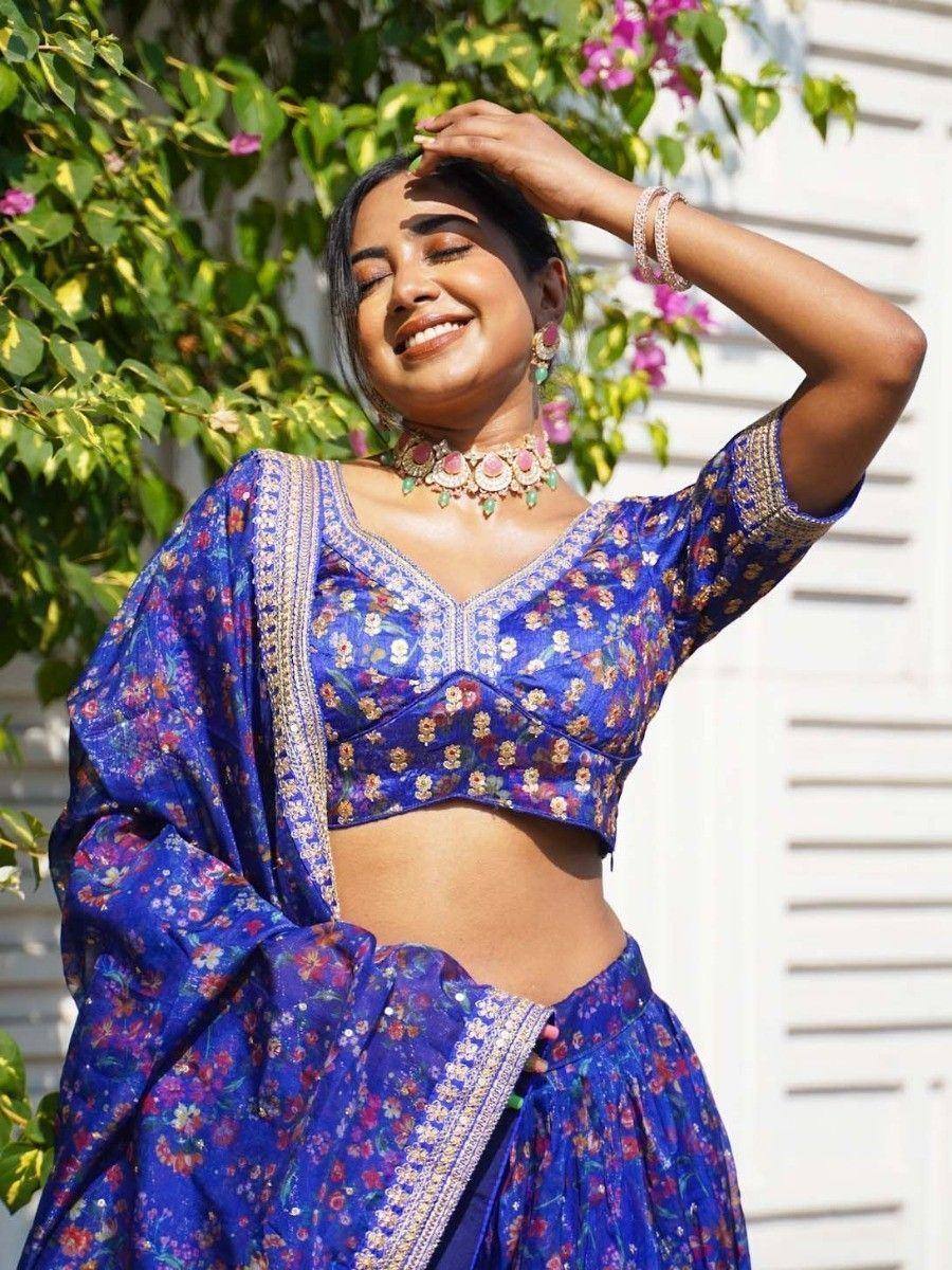 Blue floral lehenga choli with gold embroidery, perfect for Indian ethnic wear occasions