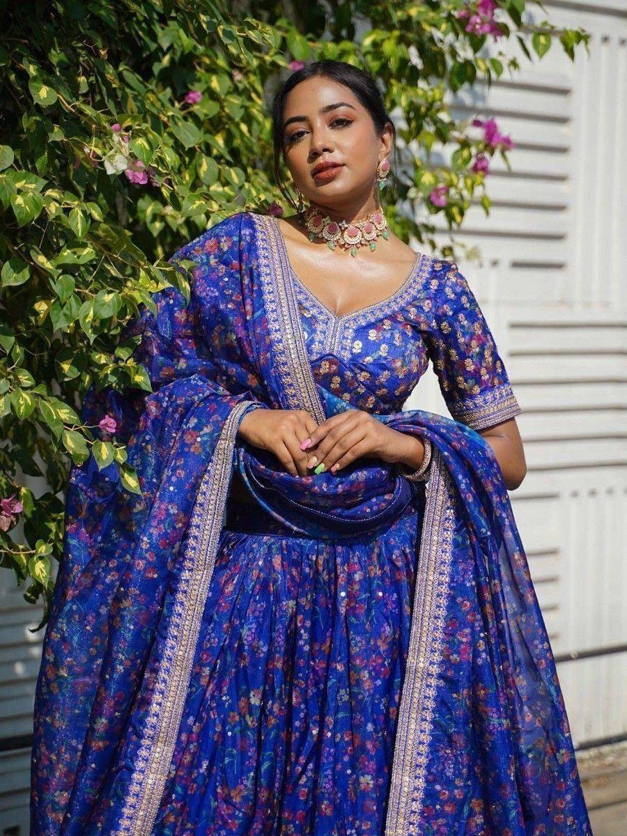 Blue floral print lehenga choli with gold border, perfect for Indian ethnic wear occasions