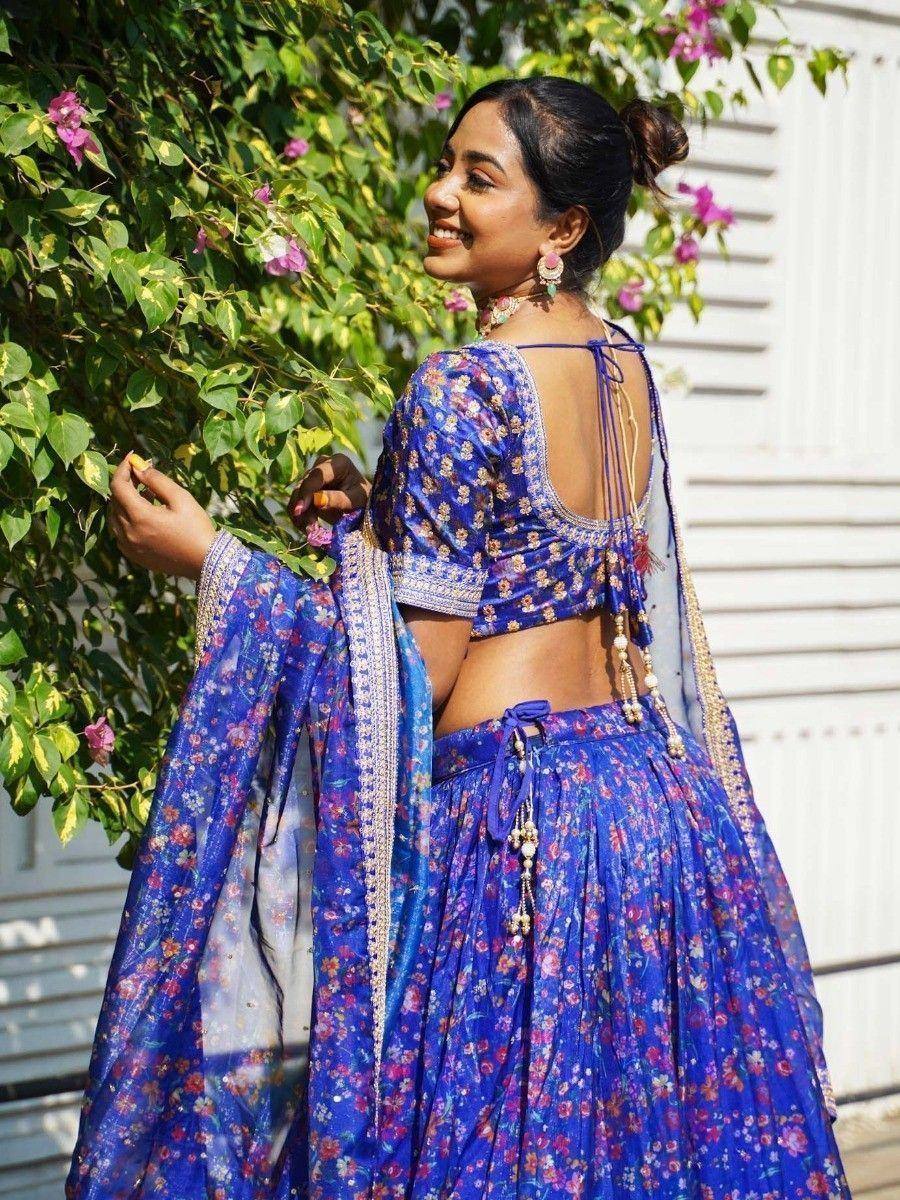 Blue floral lehenga choli with back tie detail, perfect for Indian ethnic wear occasions