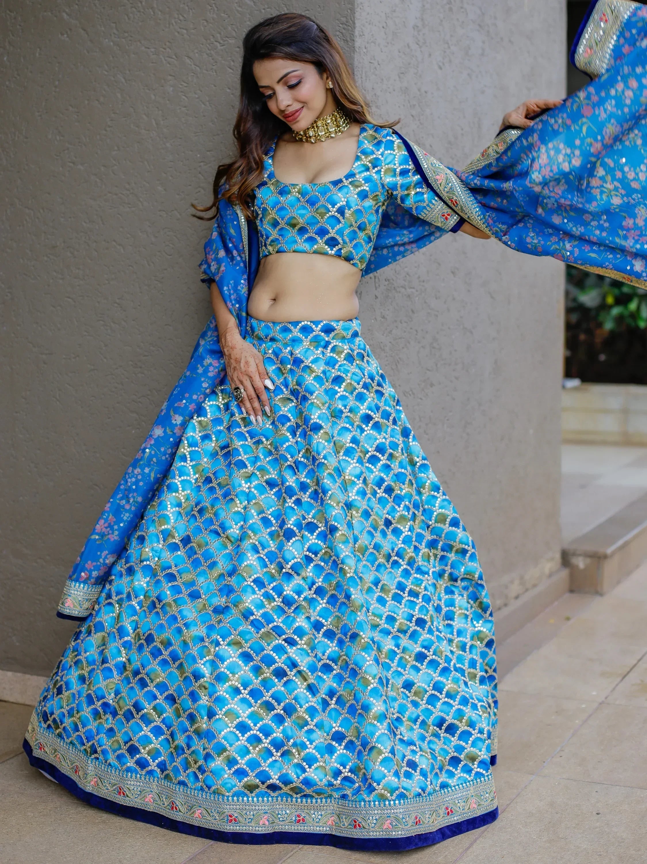 Blue designer lehenga choli with floral dupatta, perfect for Indian ethnic wear occasions