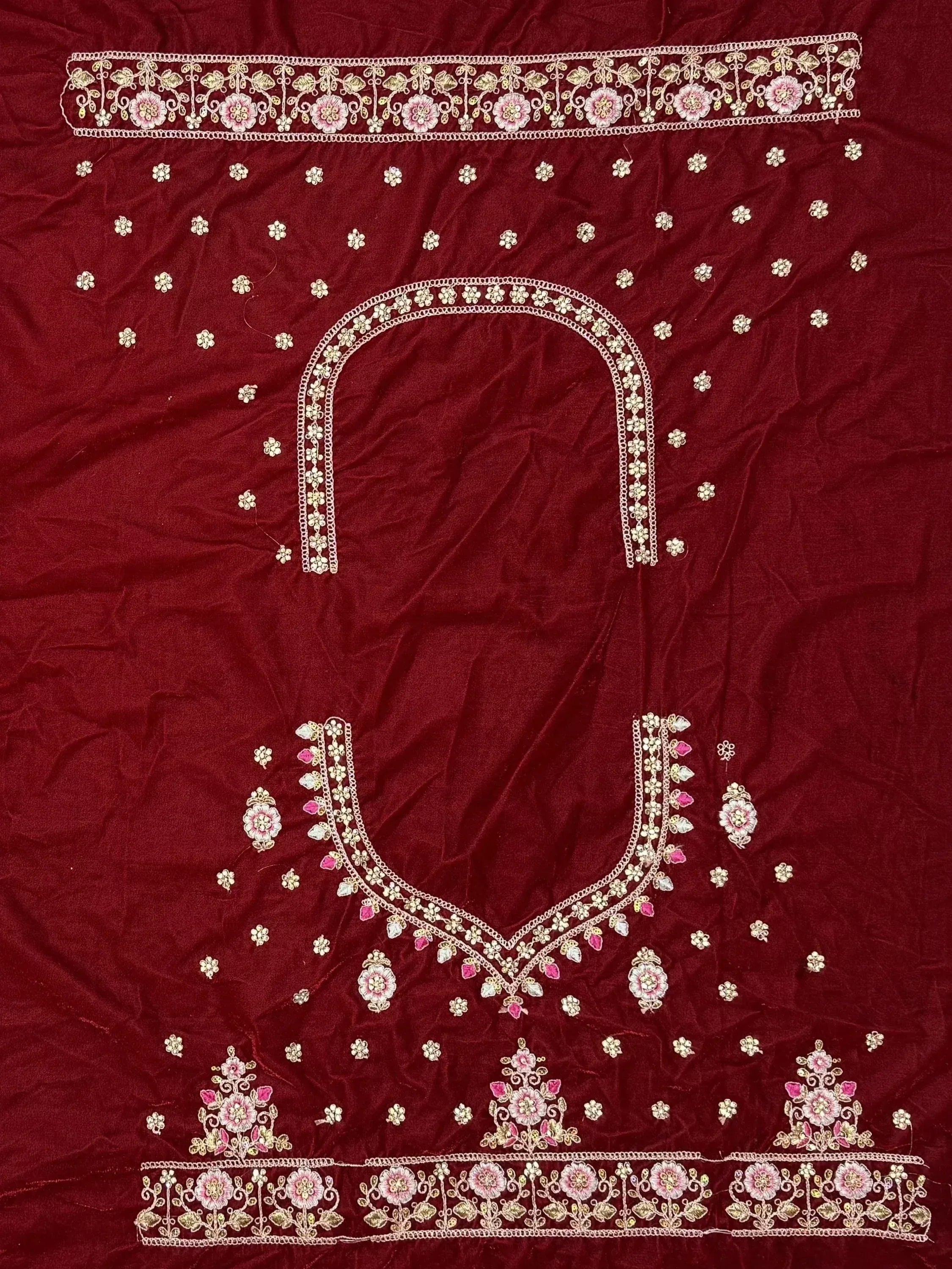 Maroon velvet ethnic top with floral embroidery and embellished neckline for Indian wear