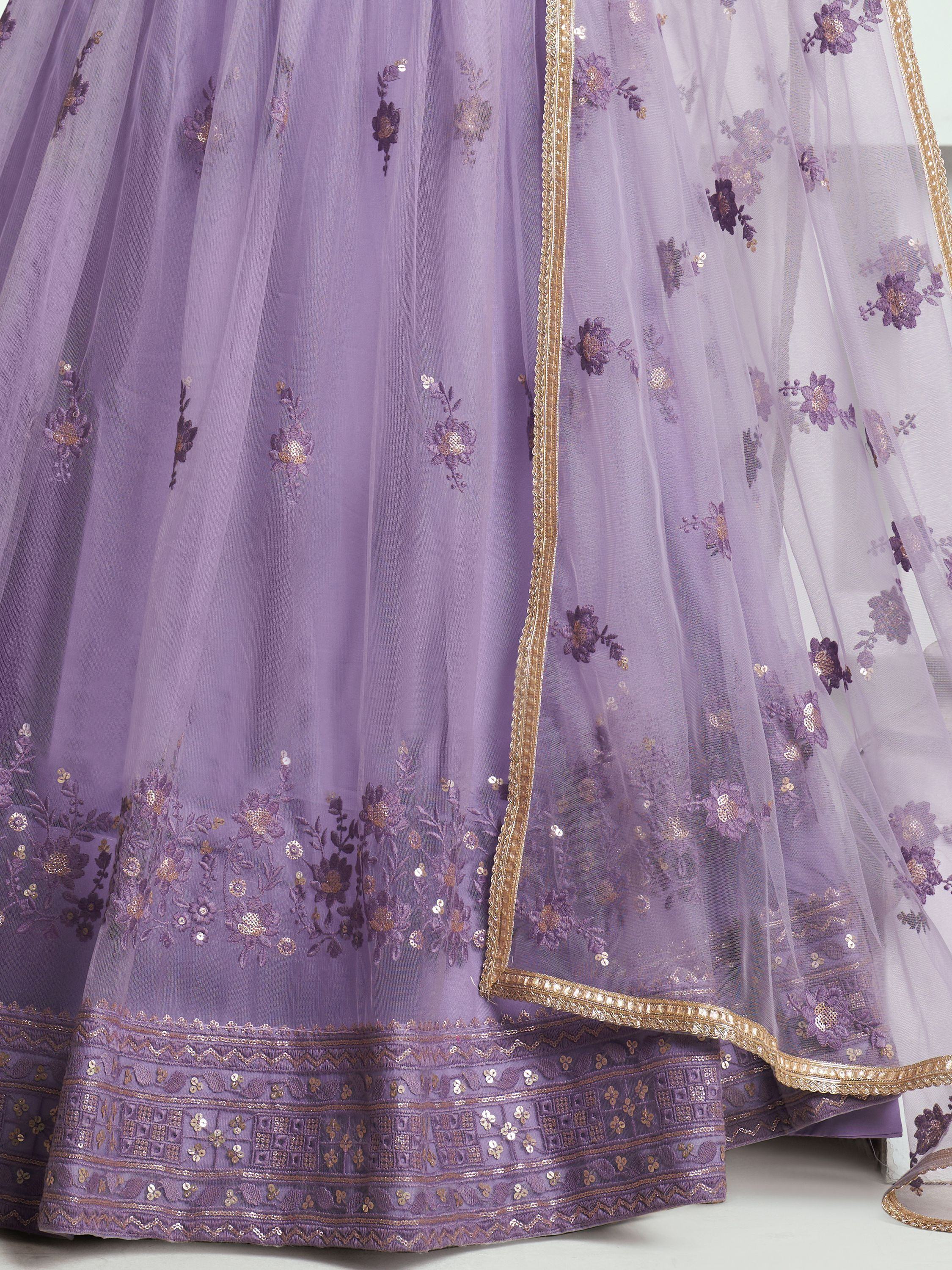 Lavender lehenga choli with floral embroidery and gold trim, perfect for Indian ethnic wear occasions