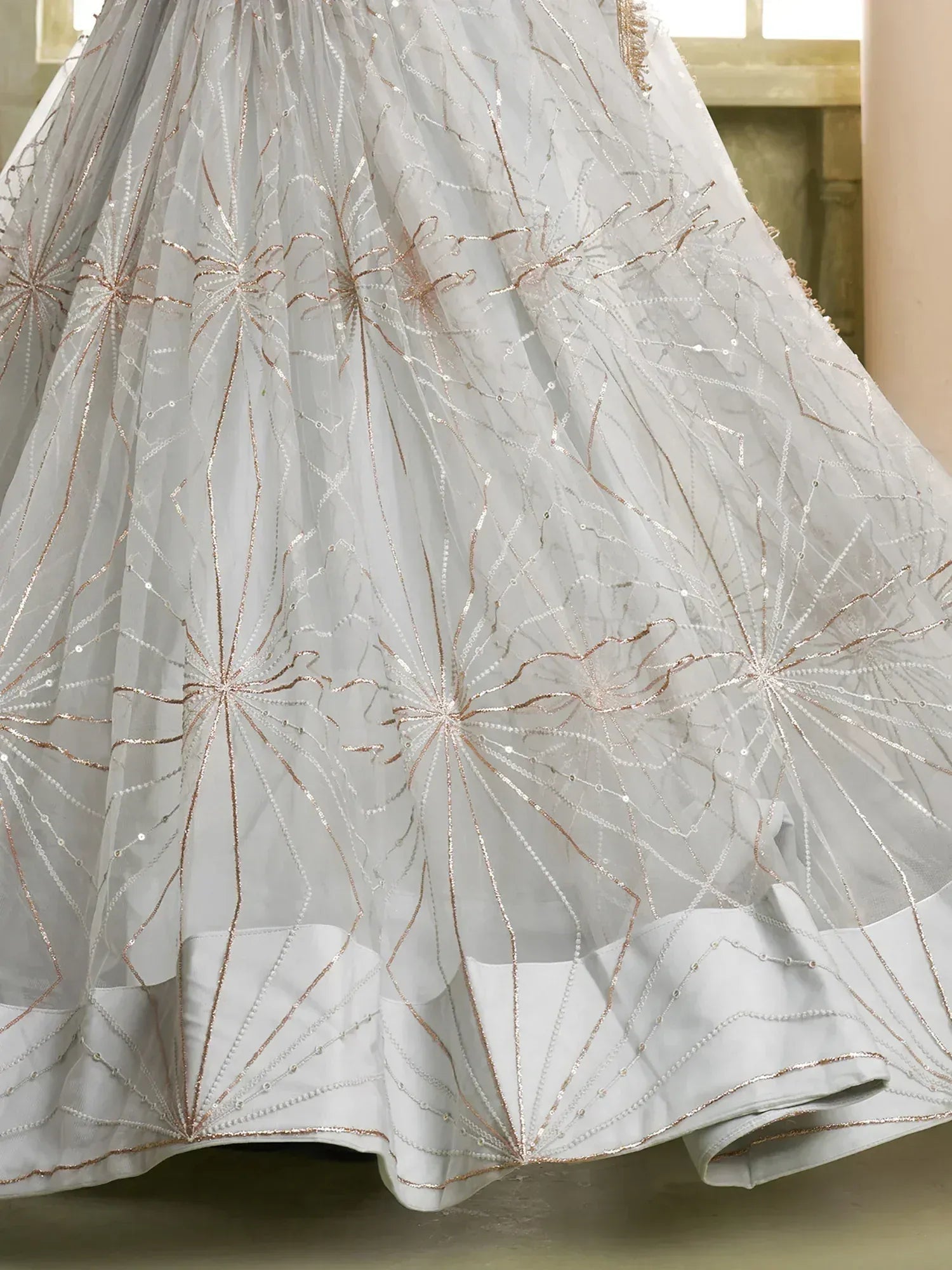 White lehenga skirt with gold thread embroidery and sequin detailing, ethnic Indian wear