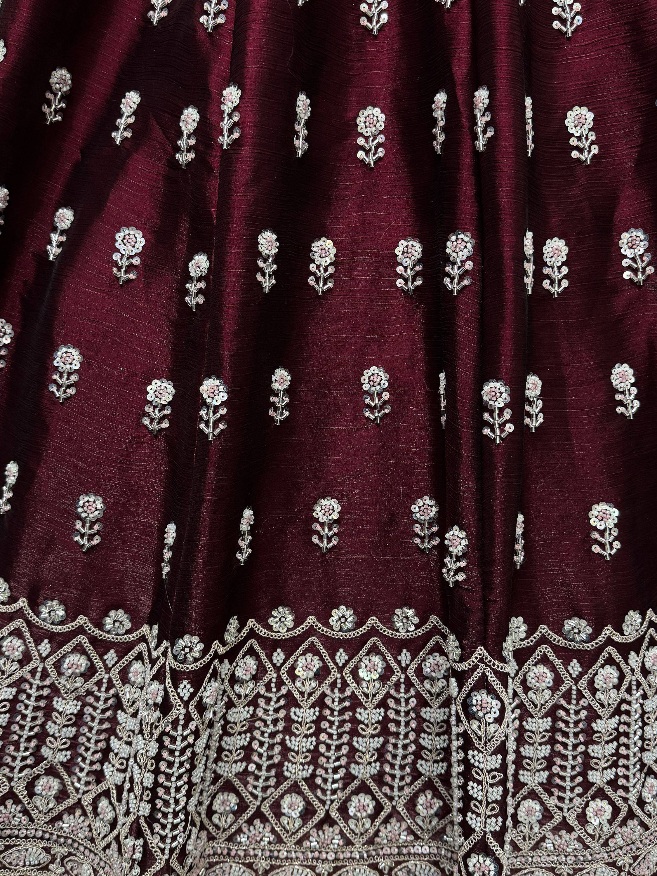 Maroon ethnic wear with floral sequin embroidery and detailed border design