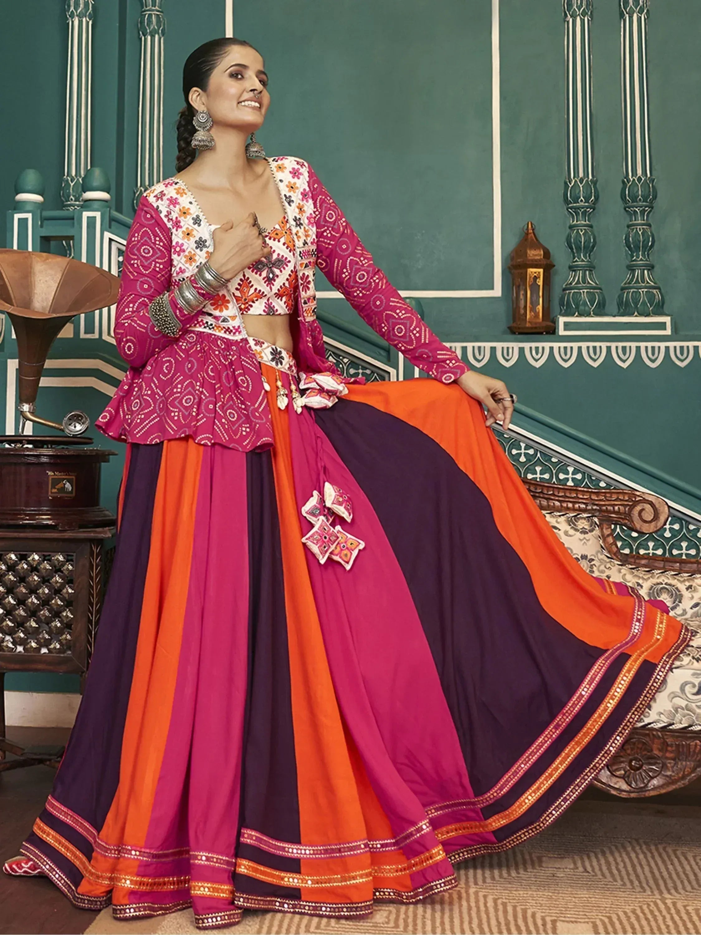 Woman in vibrant Indian ethnic lehenga choli with floral embroidery, perfect for festive occasions
