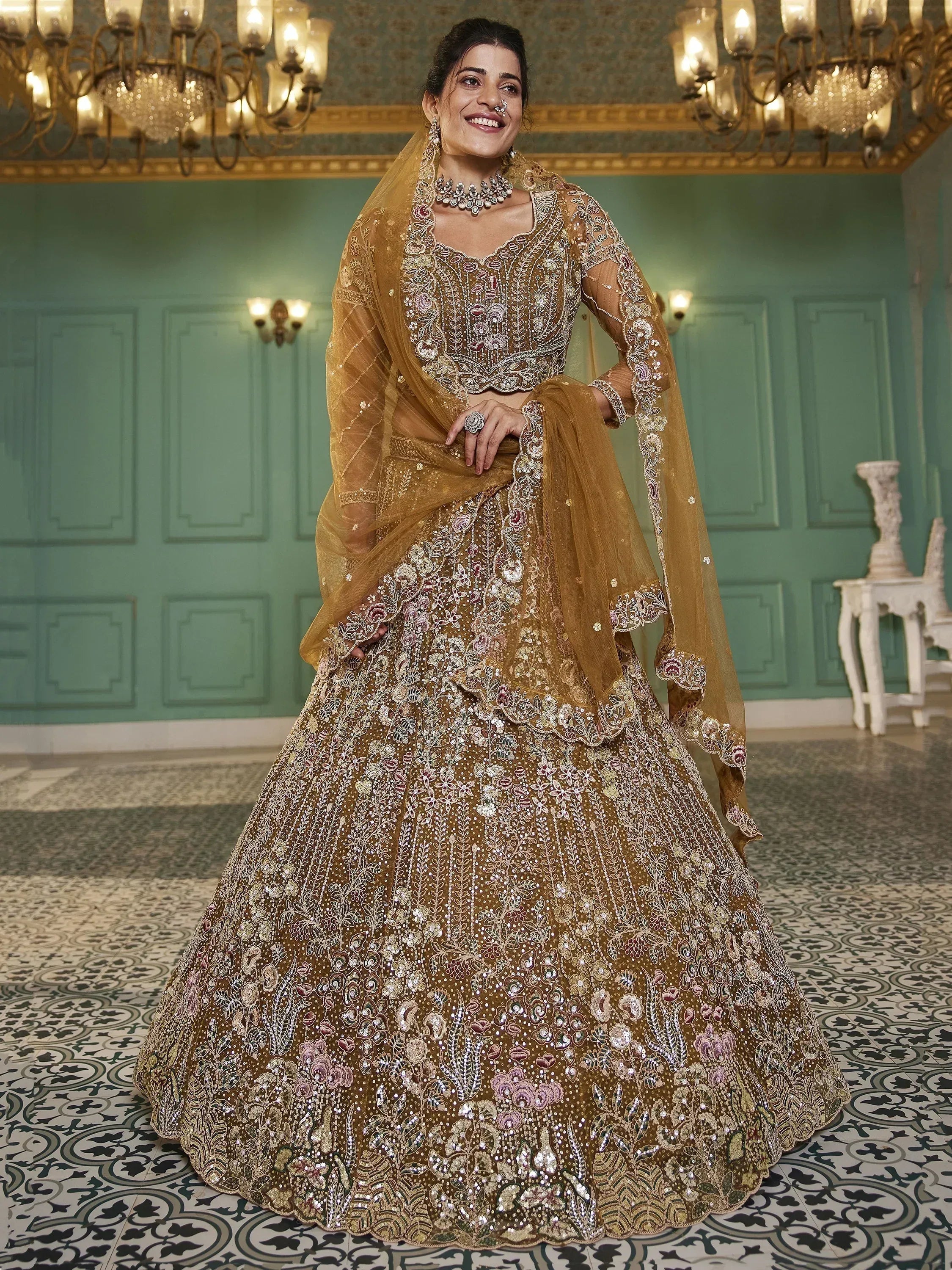 Elegant mustard lehenga choli with intricate floral embroidery and sequins, perfect for Indian weddings