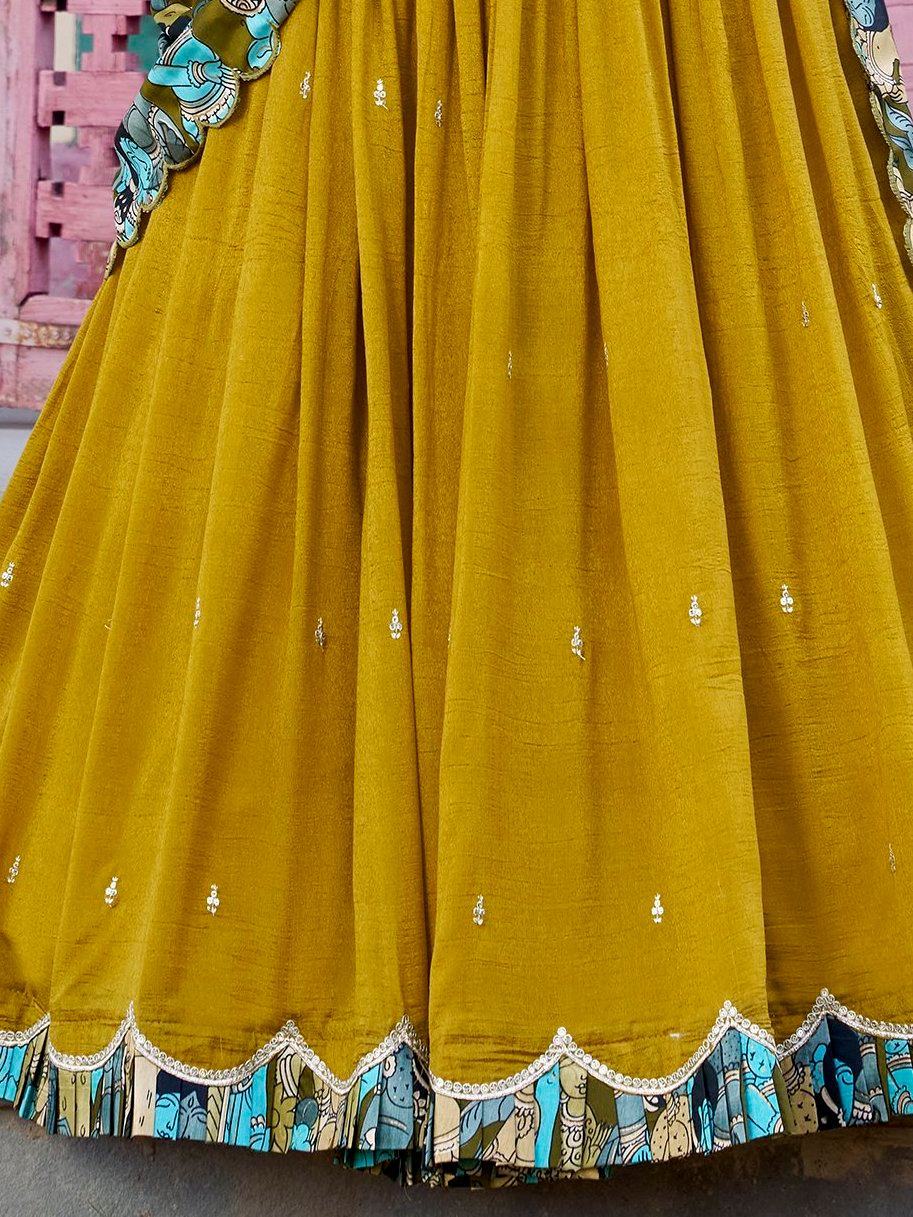 Mustard yellow lehenga with blue printed border and silver embellishments, ethnic Indian wear