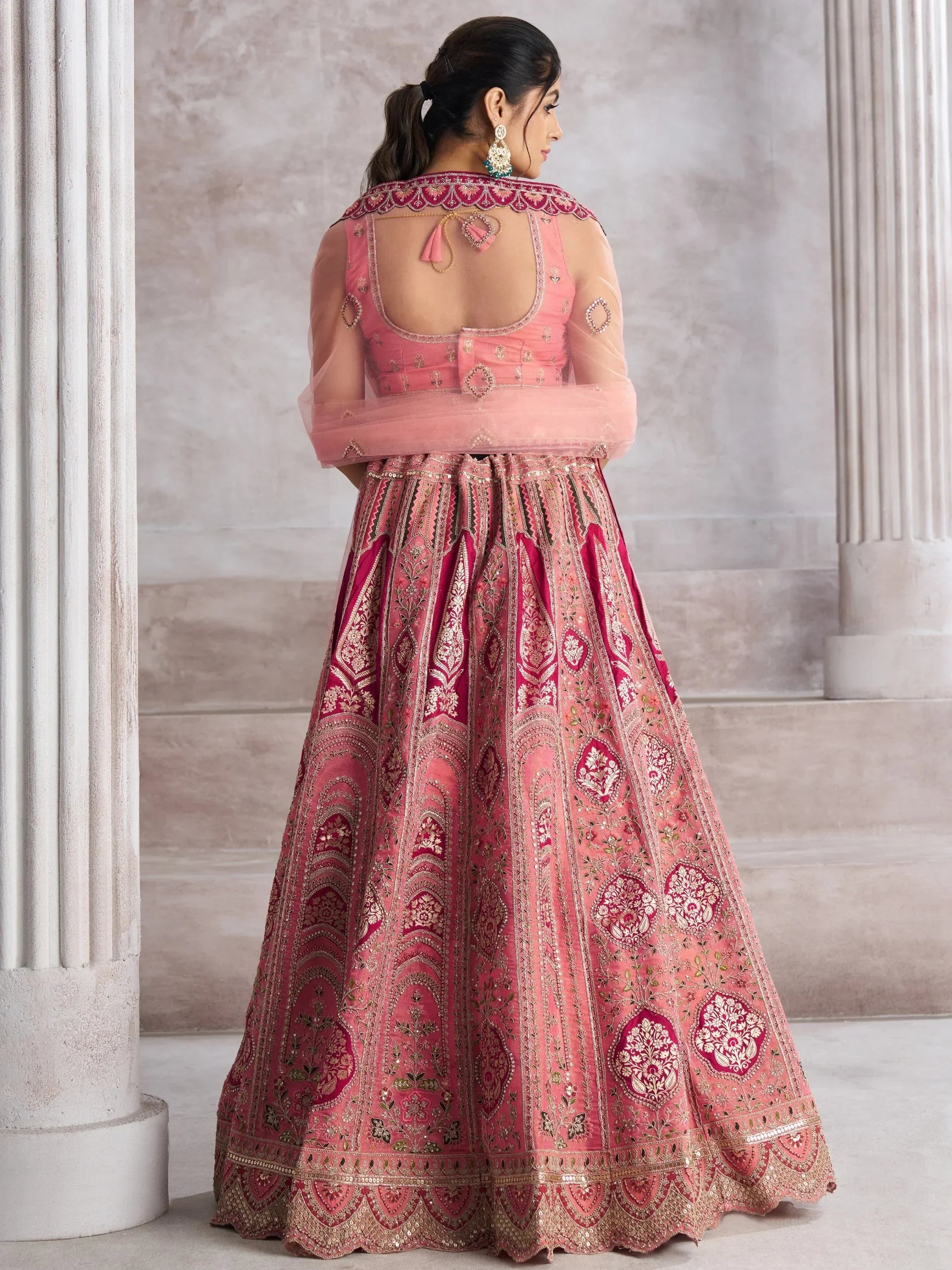 Pink embroidered lehenga choli with sheer dupatta, back view, Indian ethnic wear