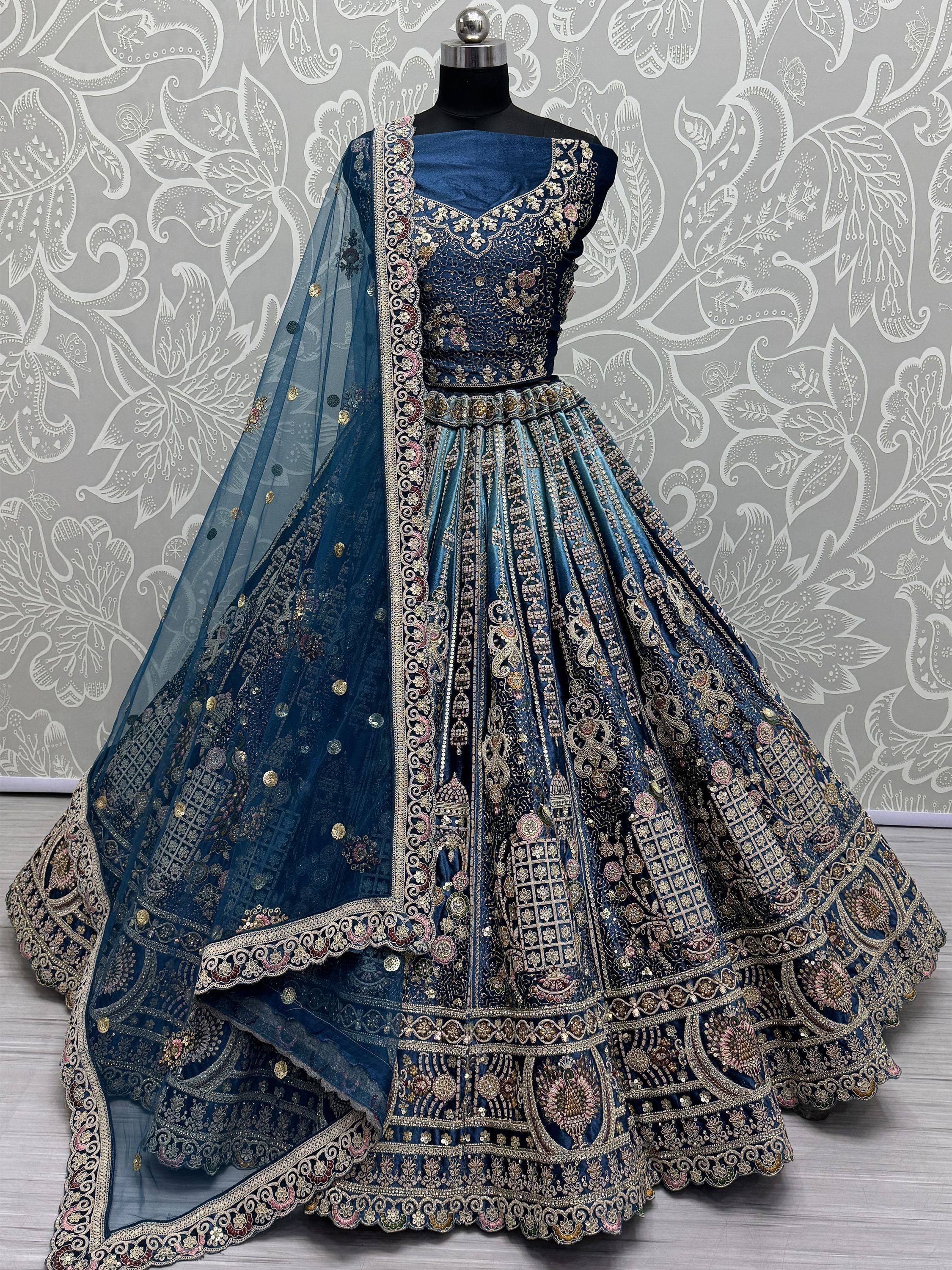 Blue designer lehenga choli with heavy embroidery and net dupatta, ethnic Indian wear