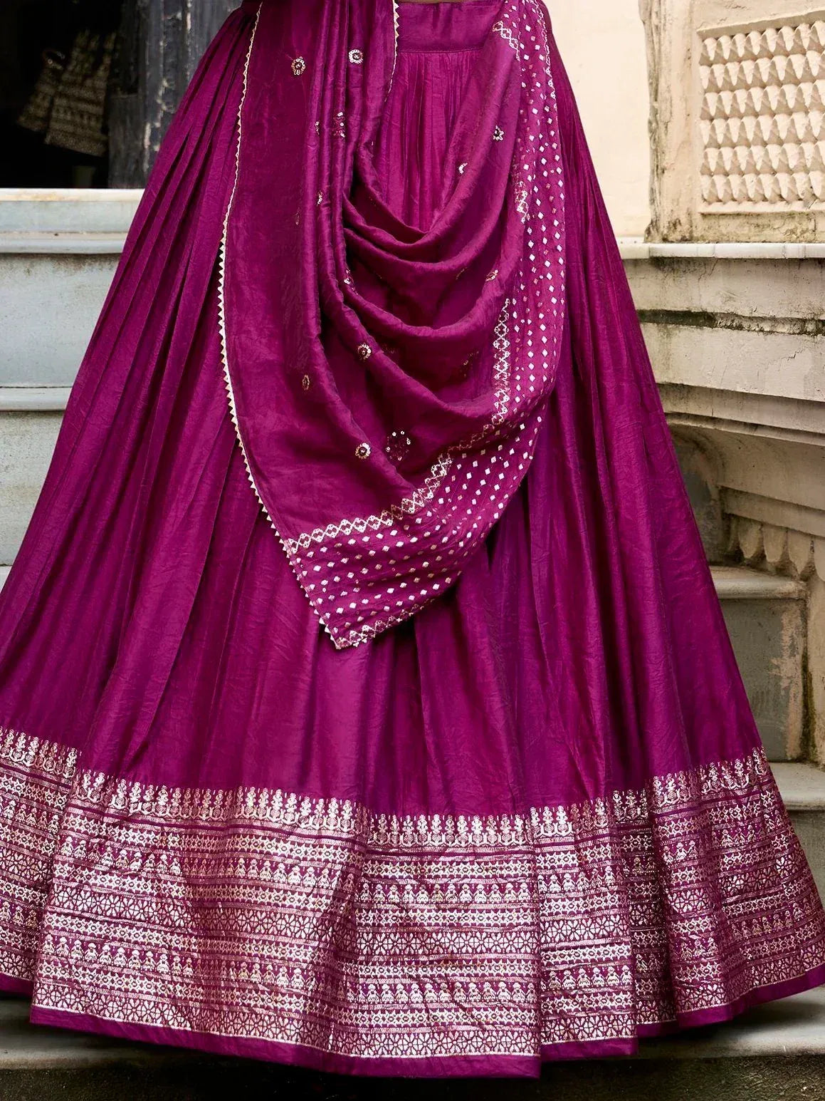 Purple ethnic lehenga choli with white block print border and dupatta, perfect for Indian weddings or festivals
