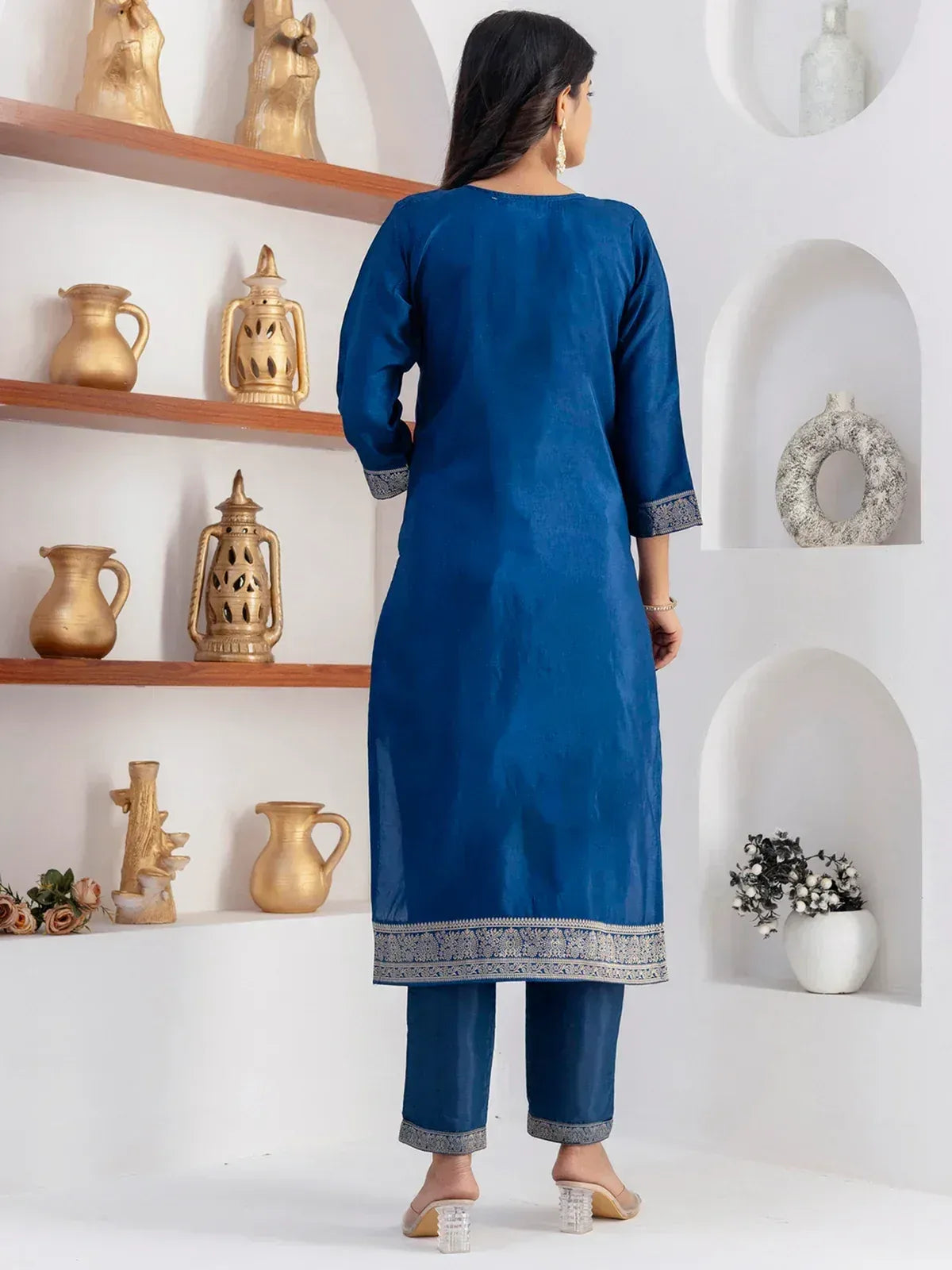 Blue ethnic kurta with silver embroidery, paired with matching pants, ideal for Indian festive wear