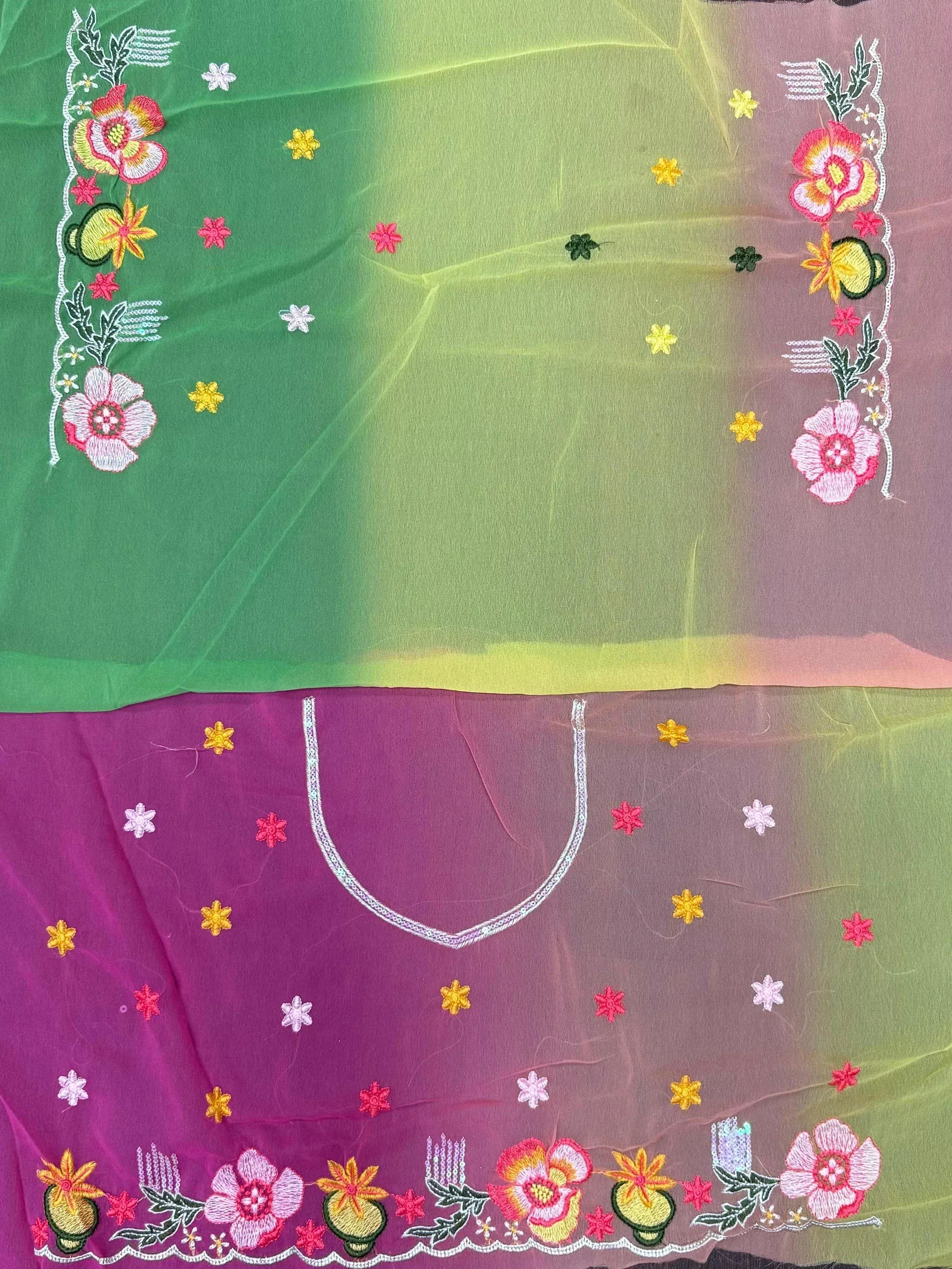 Colorful embroidered ethnic saree with floral patterns and vibrant green-purple gradient design