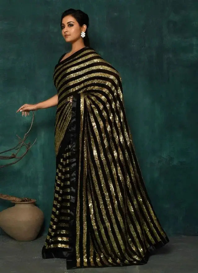 Charming Black Georgette Striped Reception Wear Saree With Blouse