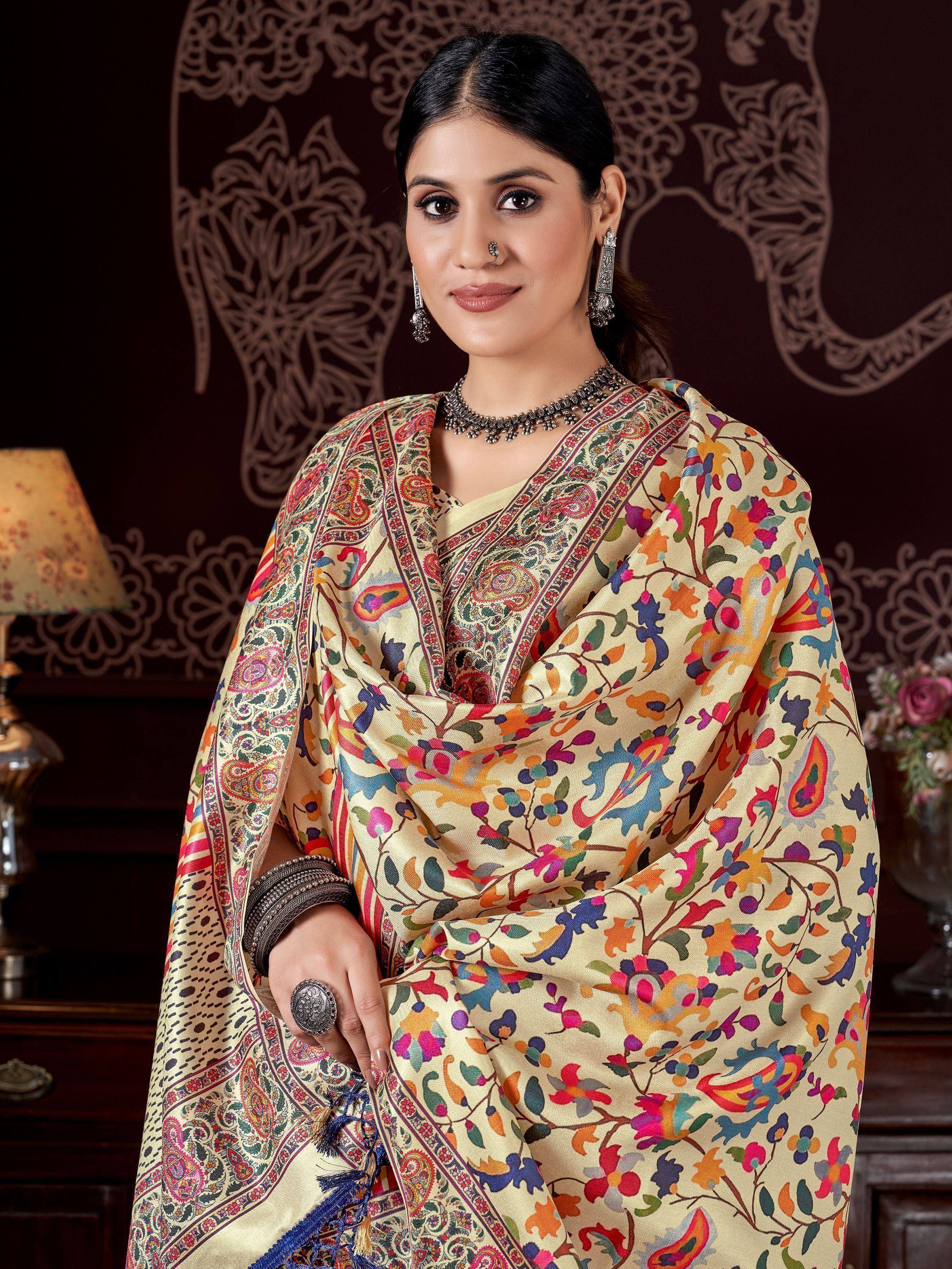 Woman in colorful floral and paisley printed saree with traditional jewelry, Indian ethnic wear