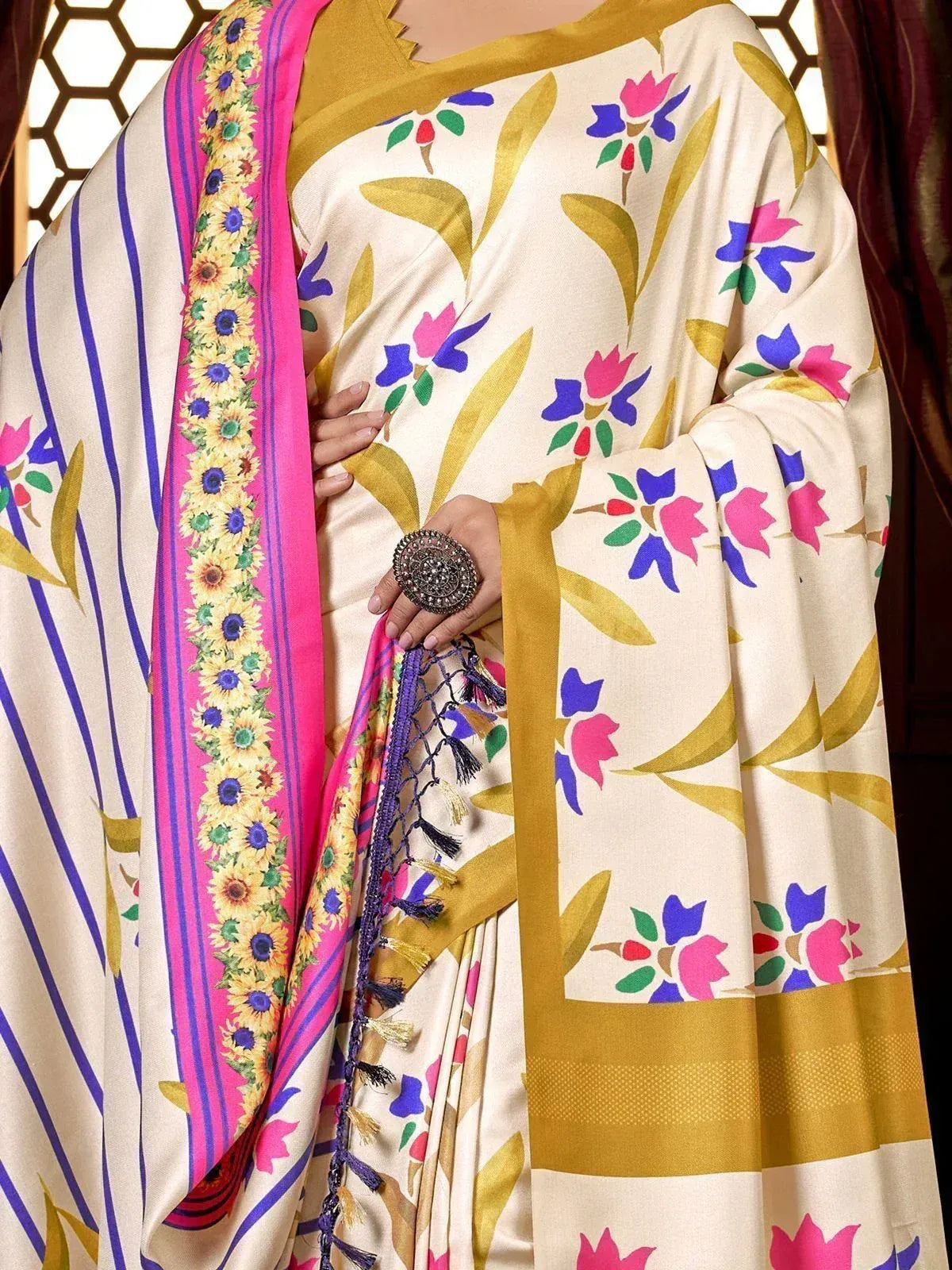 Floral print saree with pink border and tassels, ethnic Indian wear for women