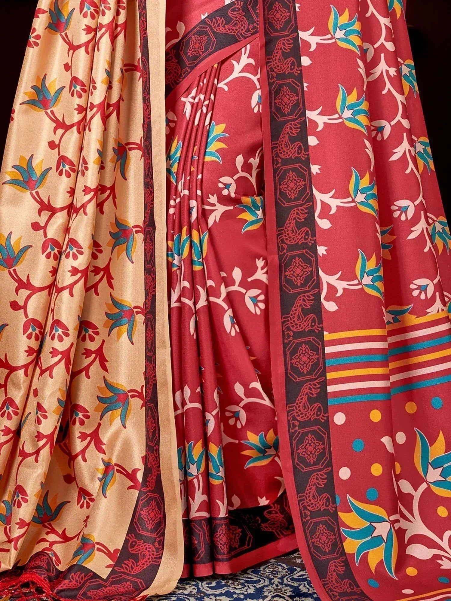 Vibrant red and beige printed sarees with floral motifs and border designs, ideal for ethnic wear