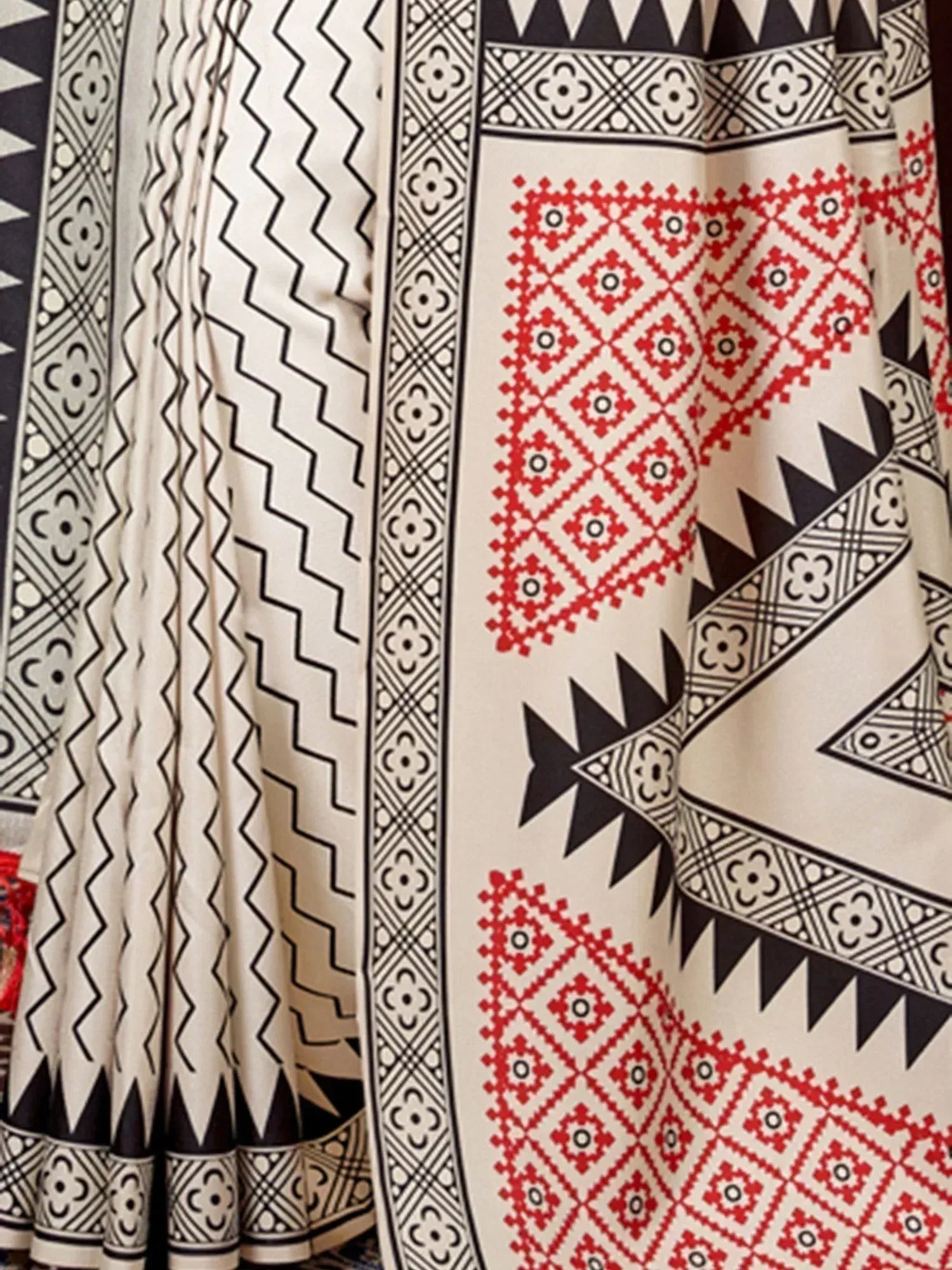 Ethnic printed lehenga with black, red, and white geometric patterns, perfect for Indian festive wear