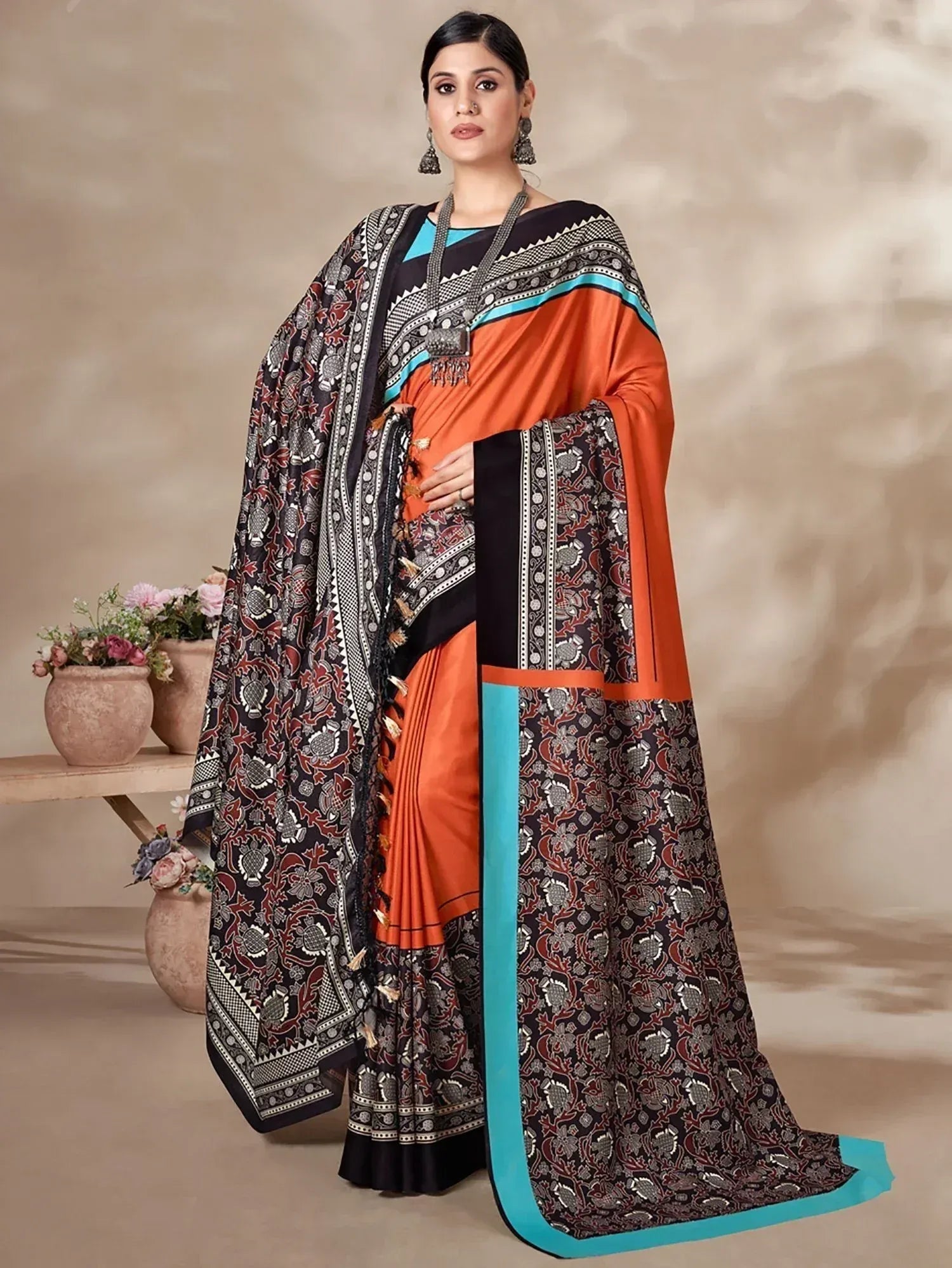 Orange and black printed saree with turquoise border, ethnic wear for women