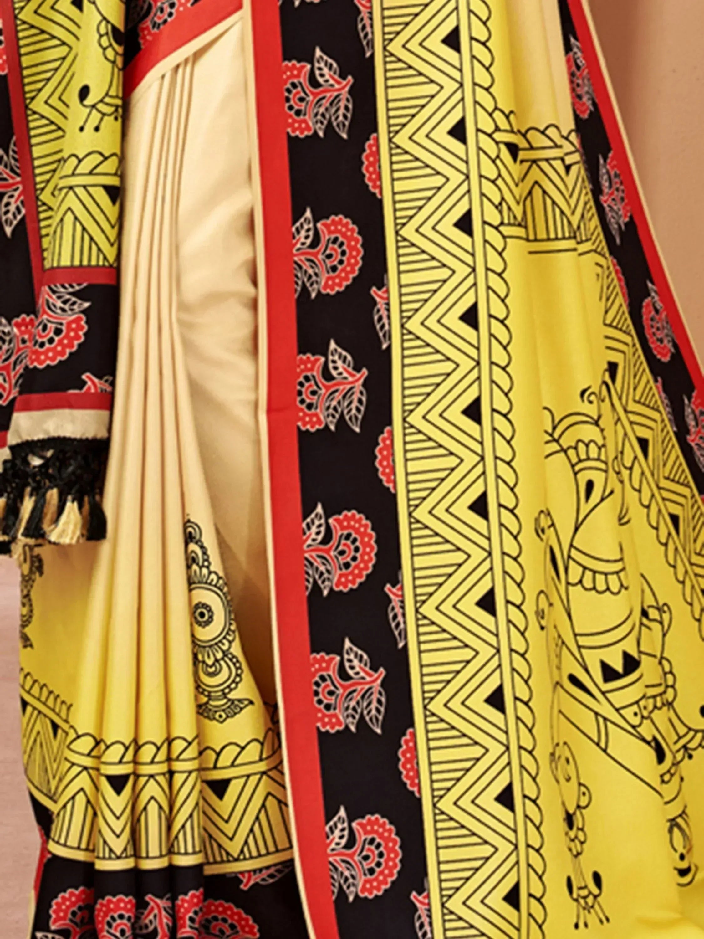 Yellow and black printed ethnic salwar kameez with red floral border and geometric patterns