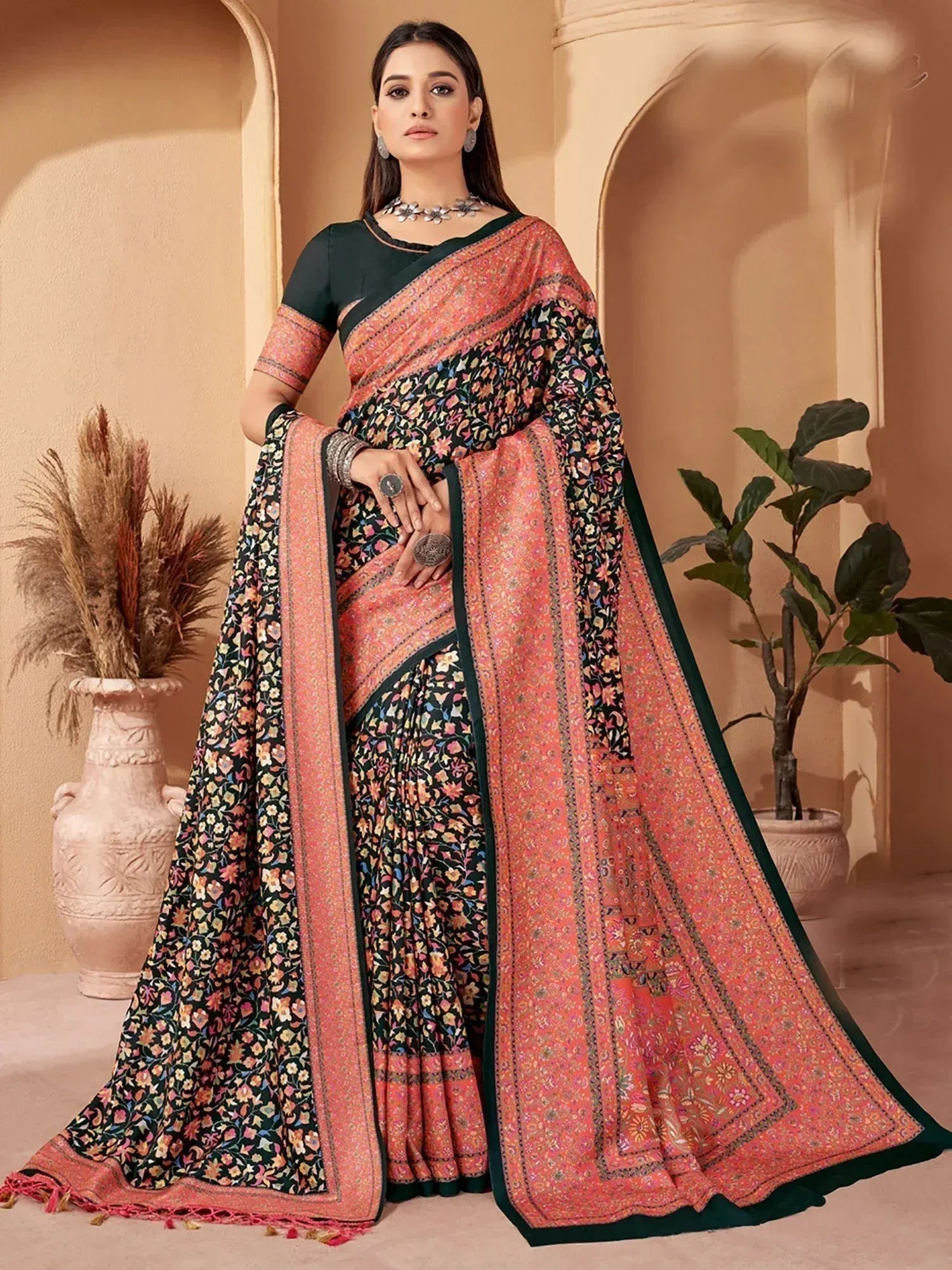 Elegant floral saree with pink border, perfect for Indian ethnic wear occasions