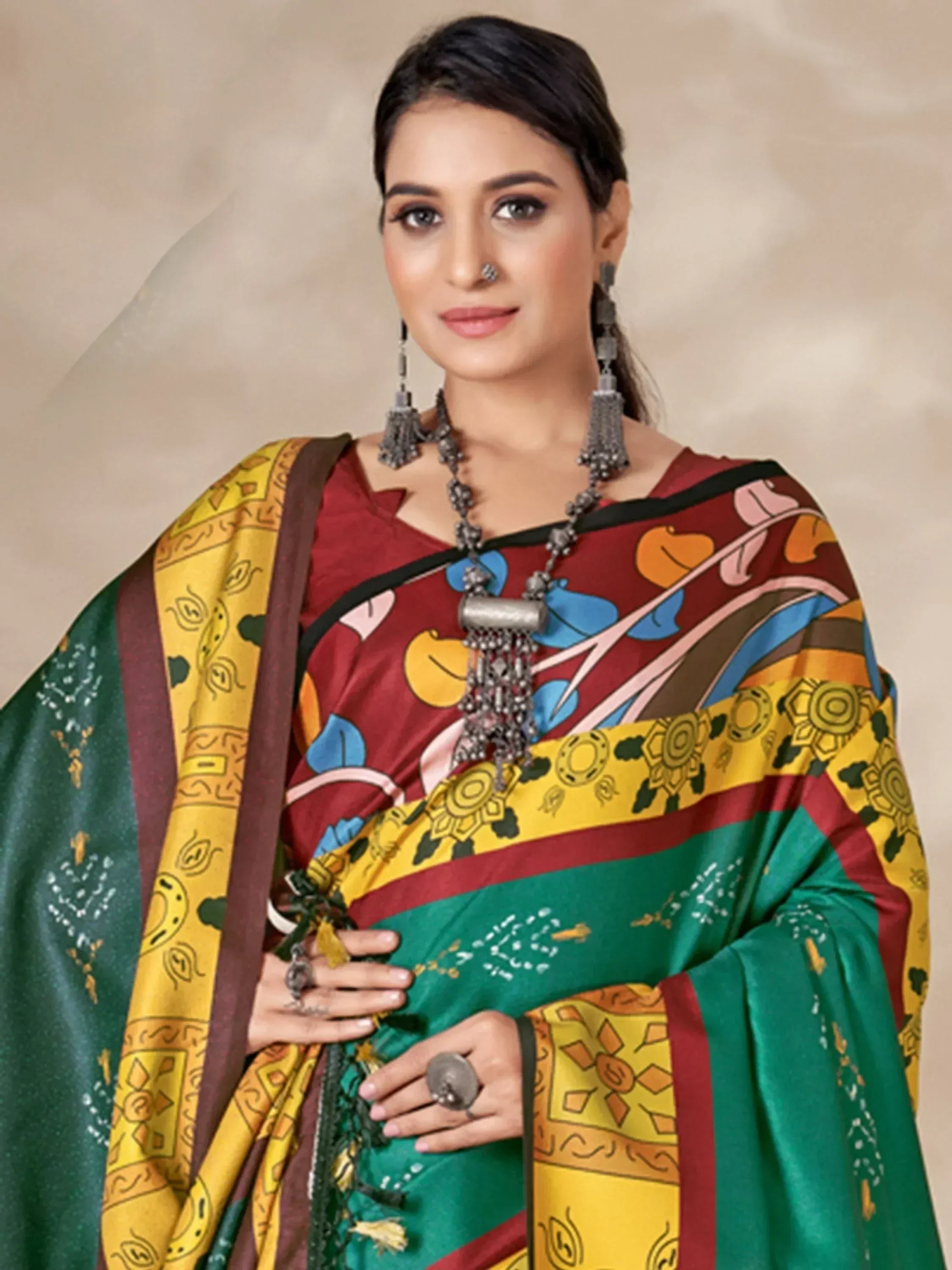 Woman in colorful printed saree with ethnic jewelry, perfect for Indian ethnic wear occasions