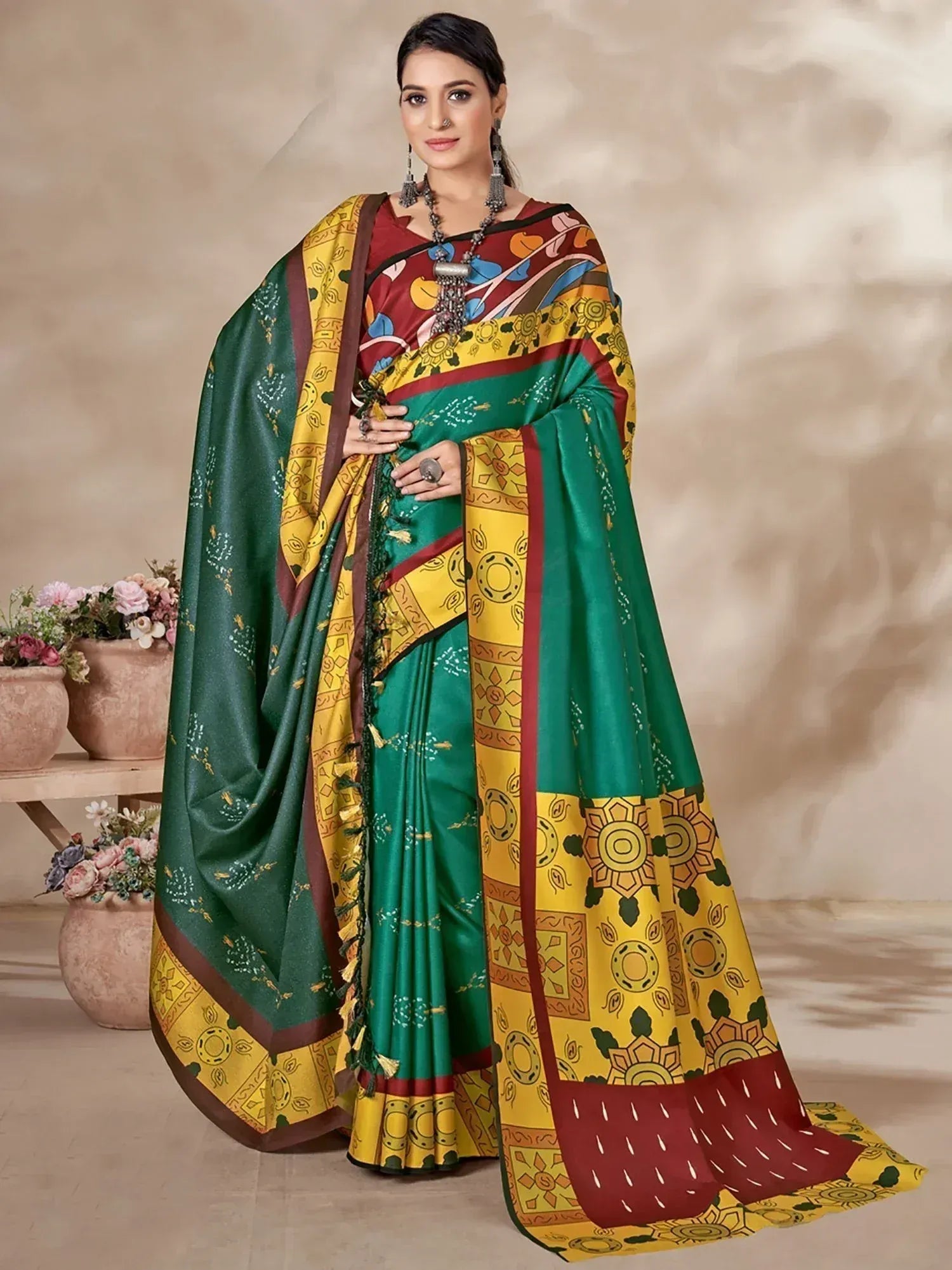 Woman in vibrant green and yellow printed saree with ethnic motifs, perfect for Indian festive occasions.