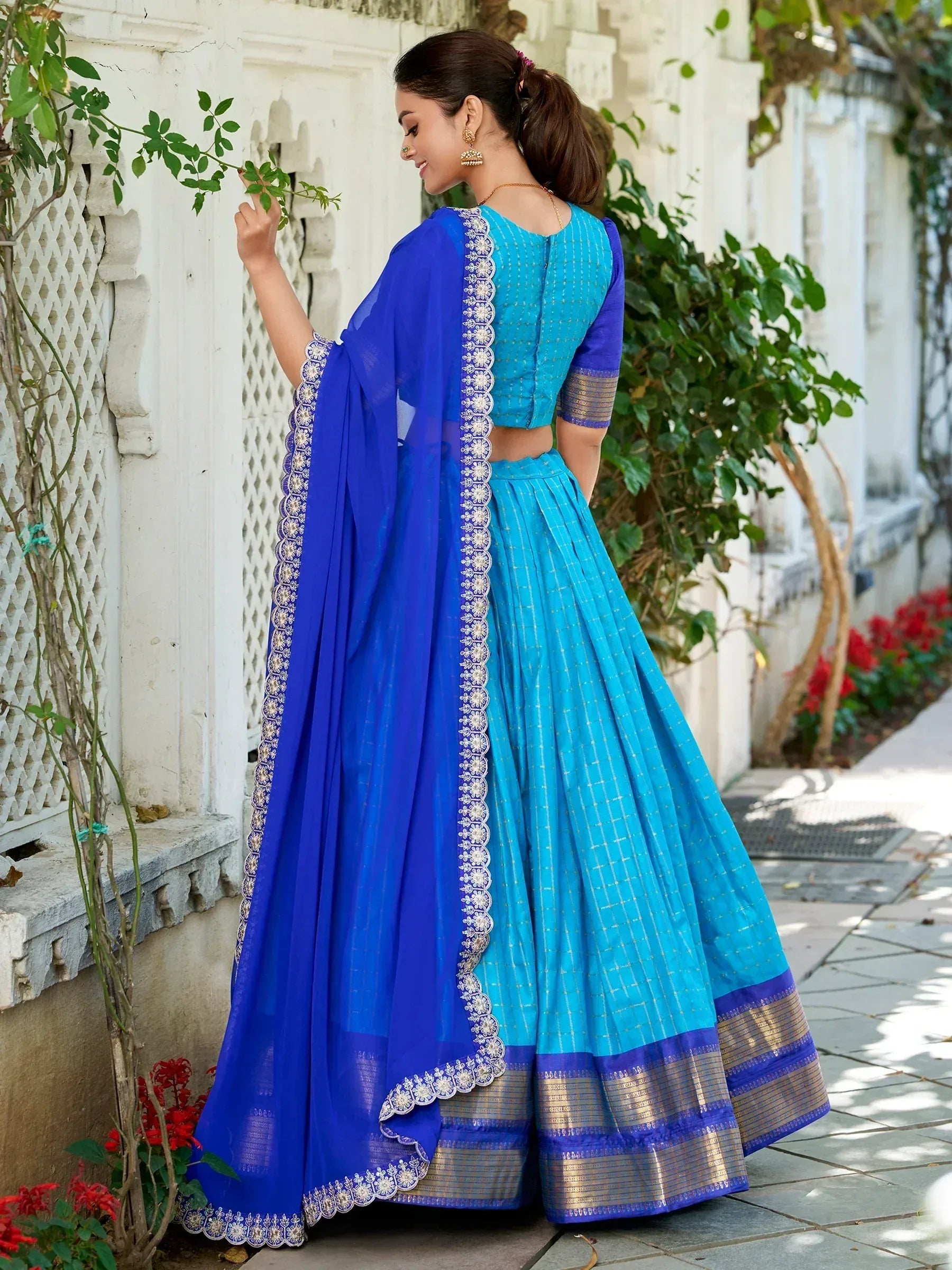Blue and turquoise lehenga choli with embroidered dupatta, perfect for Indian ethnic wear