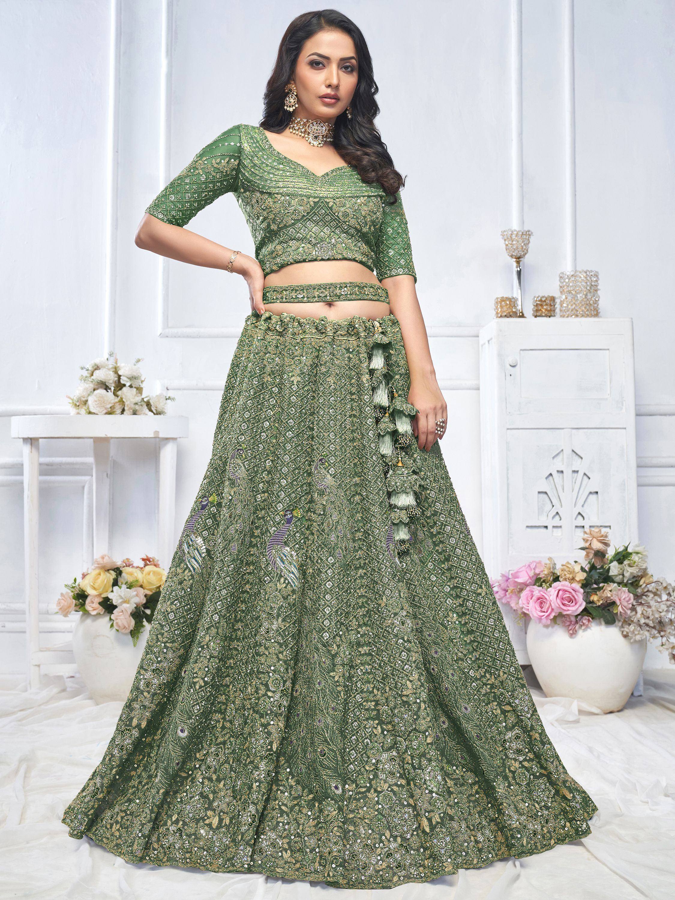 Emerald green designer lehenga choli with peacock embroidery and gold sequins for weddings