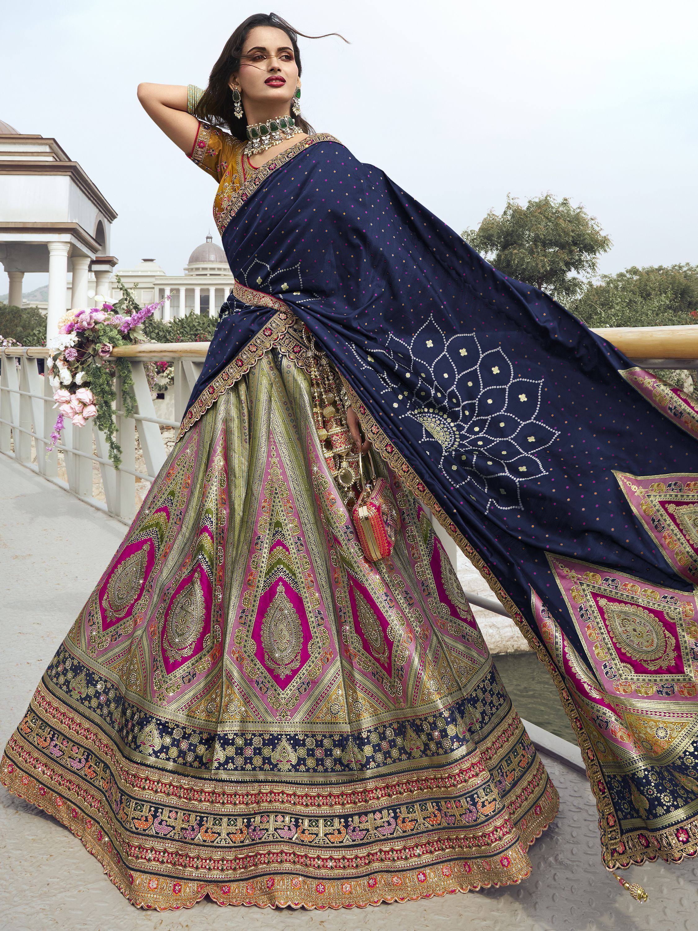 Elegant Indian designer lehenga choli with navy dupatta, perfect for weddings and festivals.