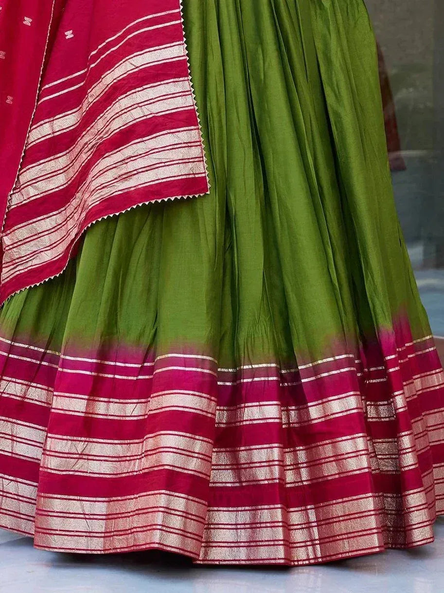Green and pink striped lehenga choli with gold border, ethnic Indian wear