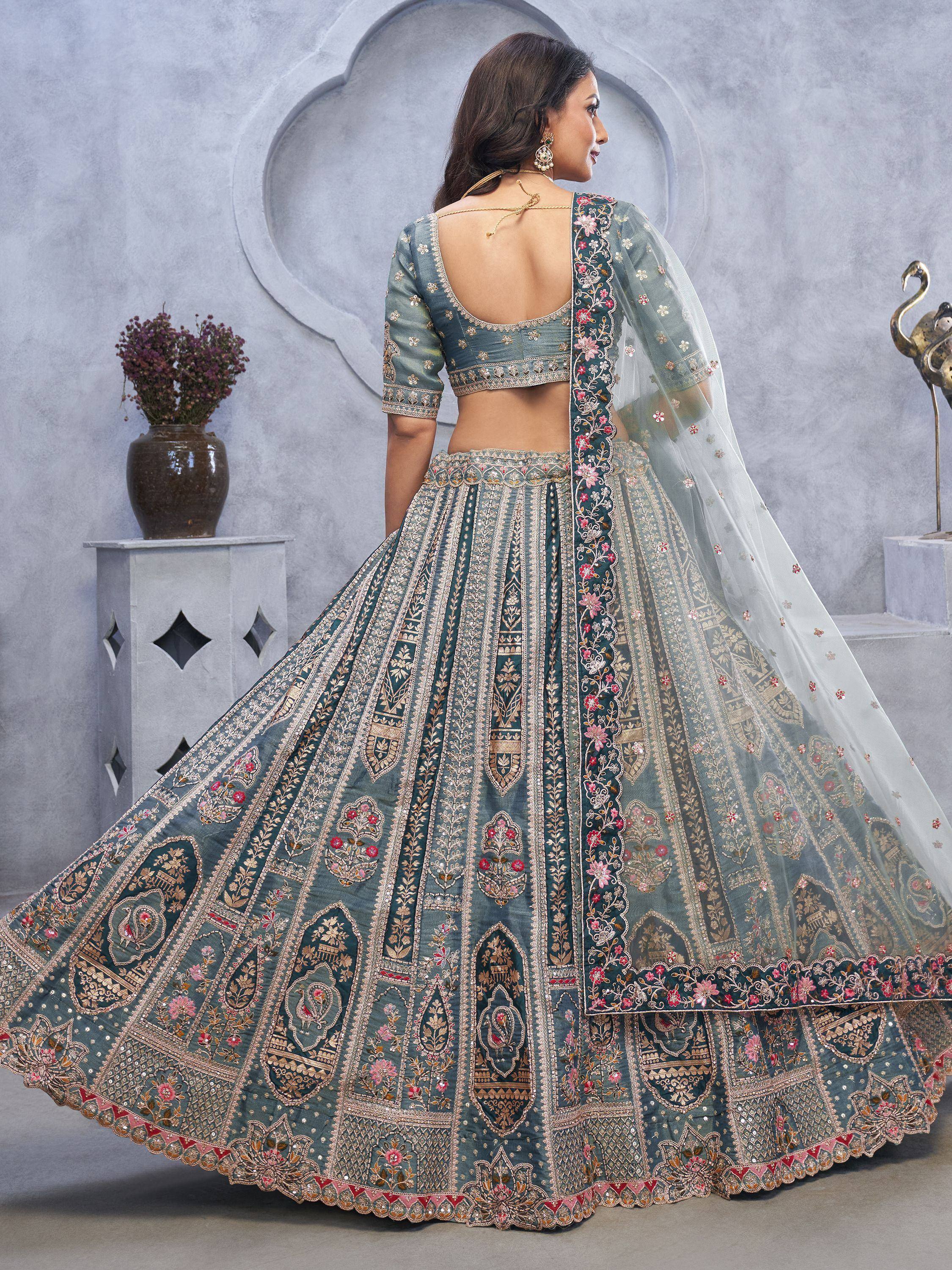 Teal embroidered lehenga choli with floral dupatta, back view, Indian ethnic wear