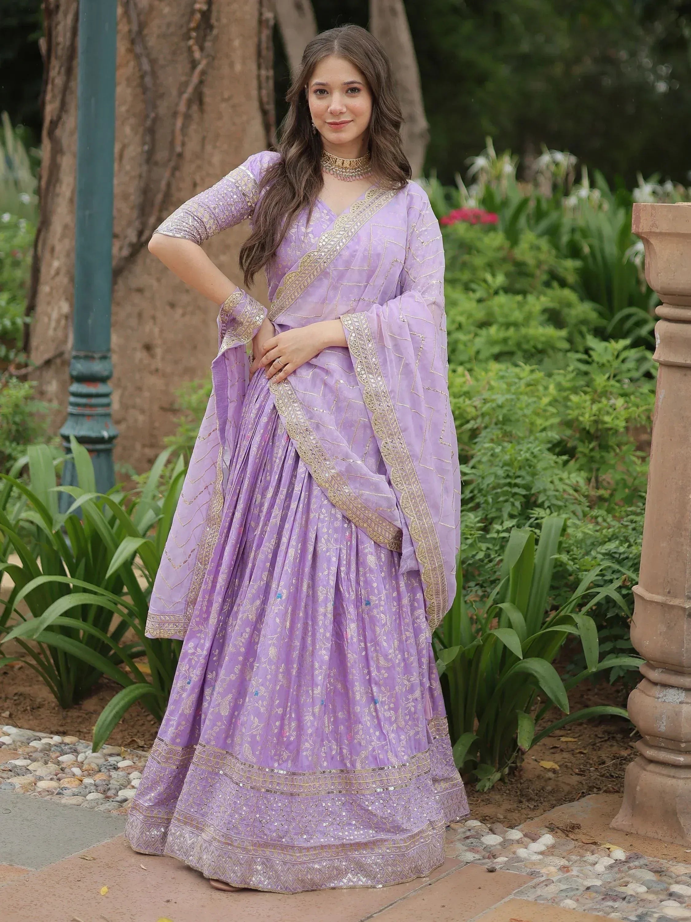 Lavender designer lehenga choli with gold embroidery, perfect for Indian ethnic wear and festive occasions.