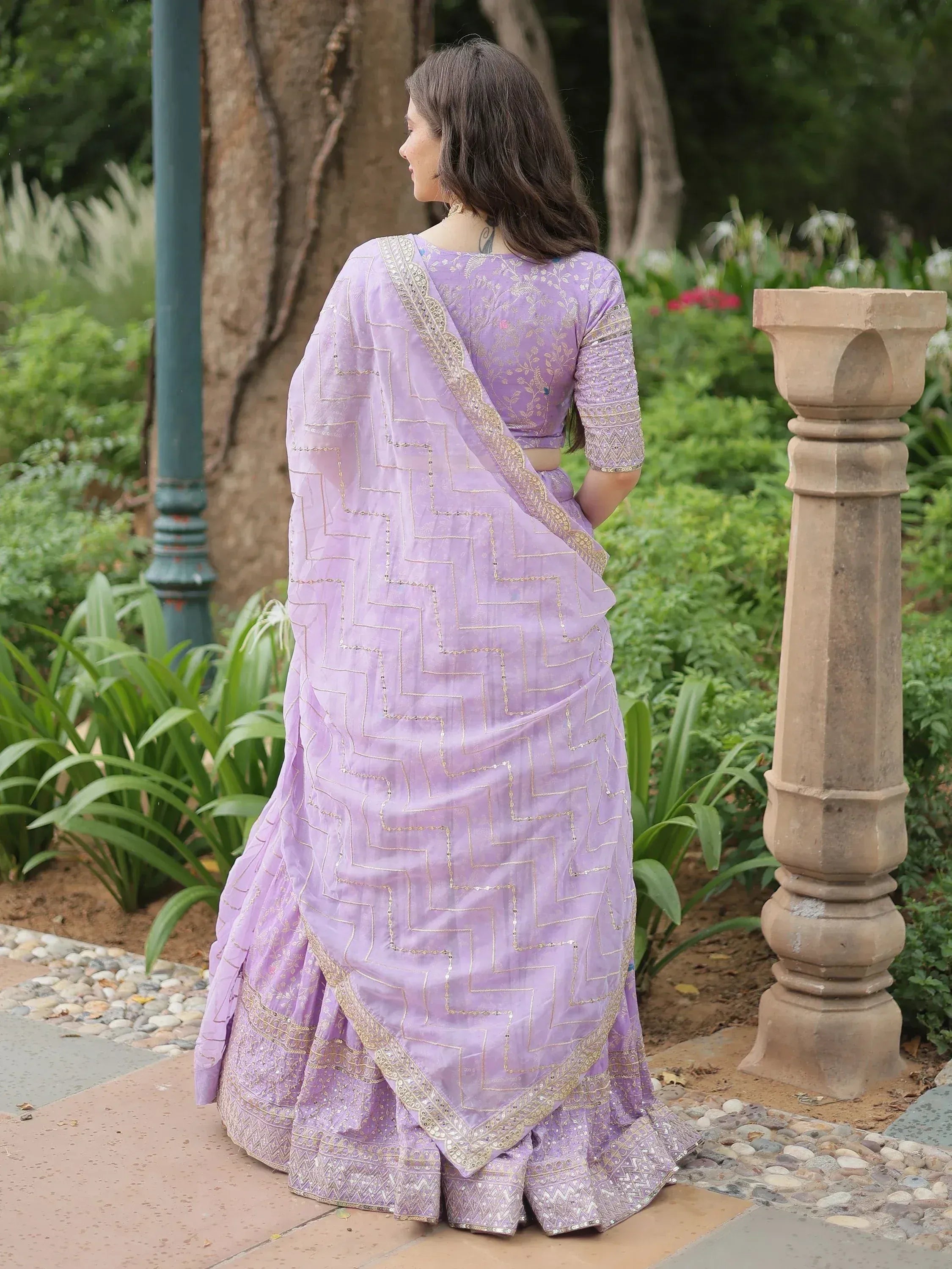 Lavender designer lehenga choli with gold zigzag embroidery, perfect for Indian ethnic wear occasions