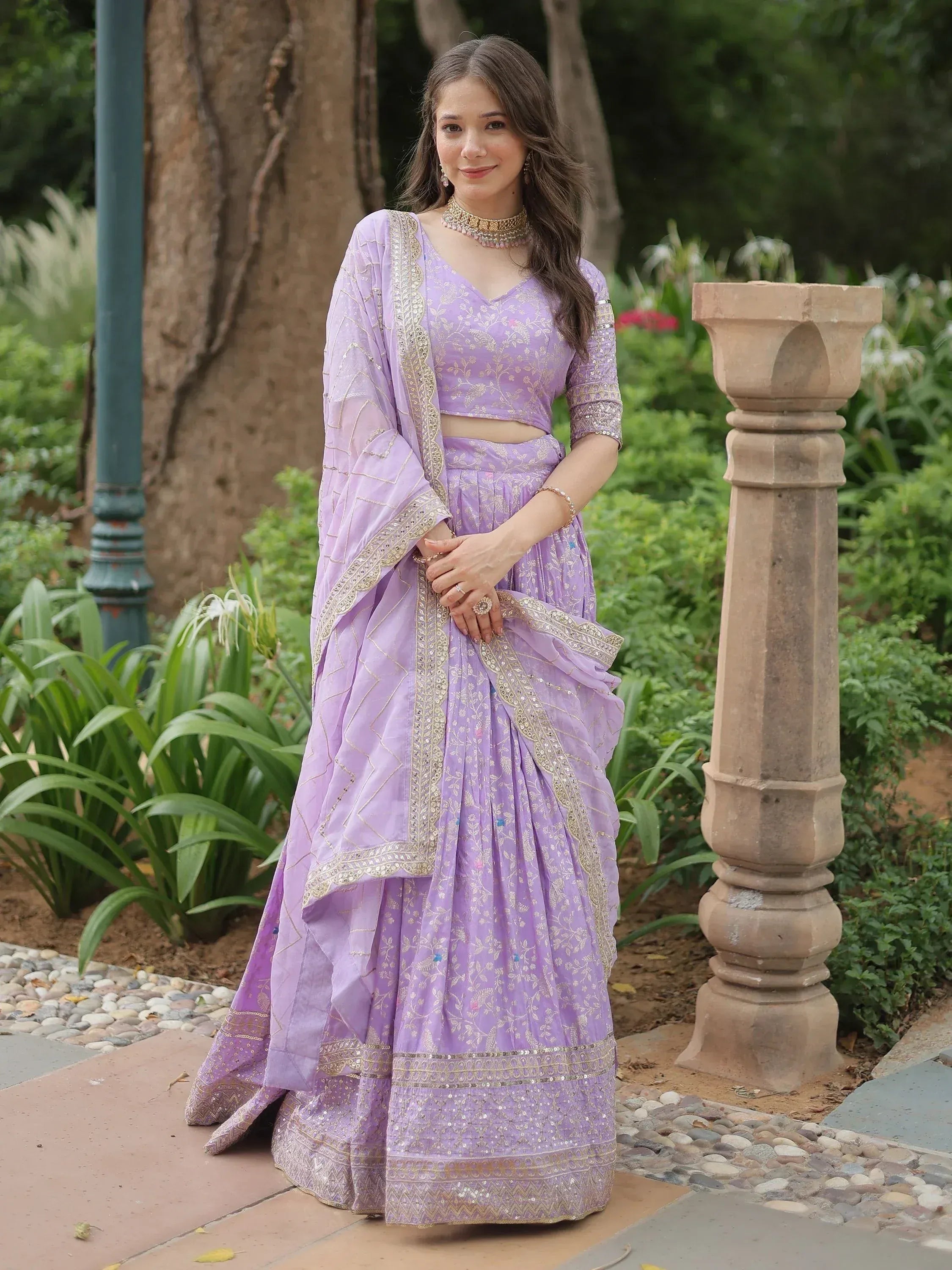 Lavender designer lehenga choli with gold embroidery, perfect for Indian ethnic wear events