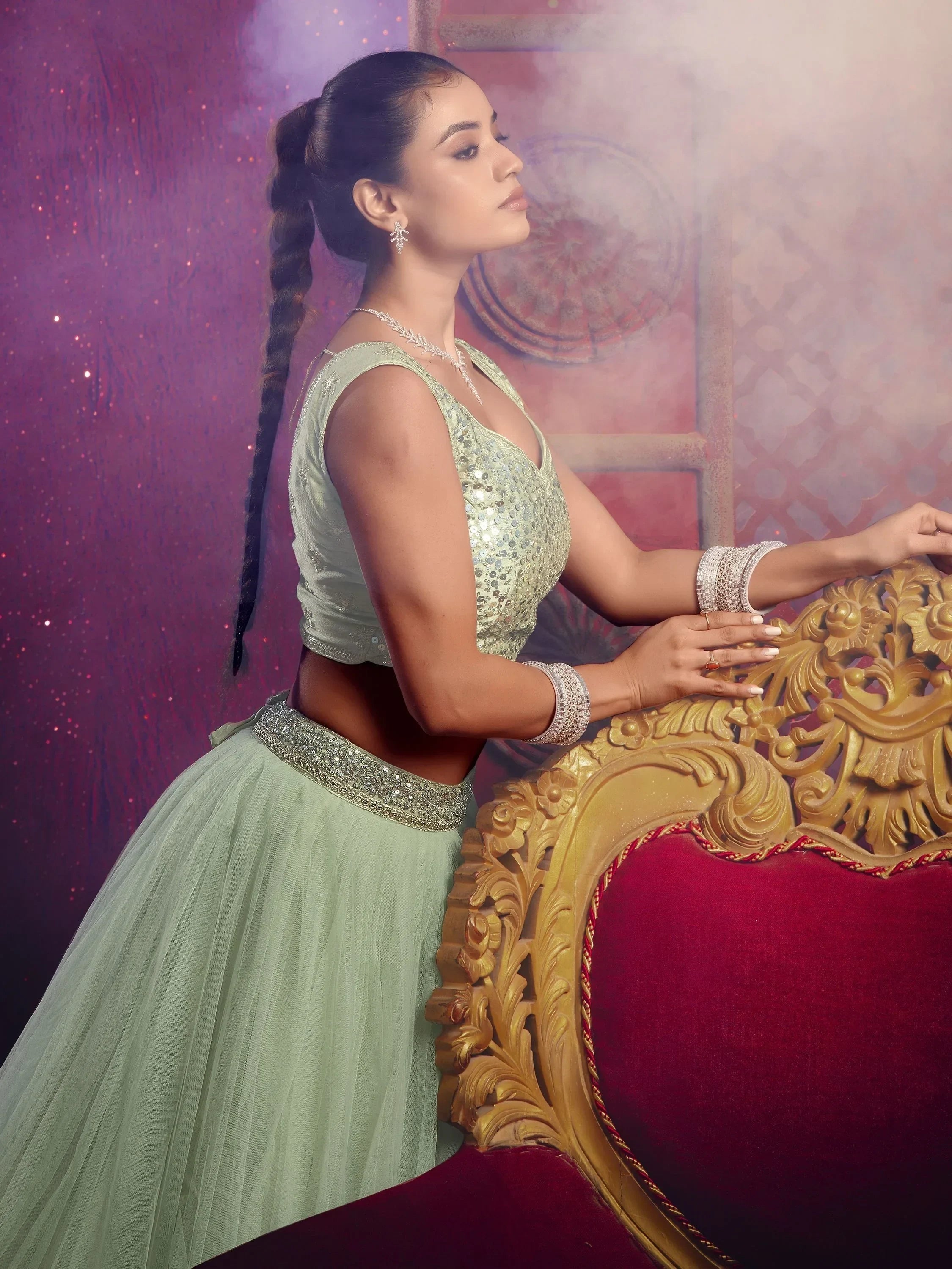 Mint green sequin lehenga choli with tulle skirt, perfect for Indian ethnic wear and festive occasions.