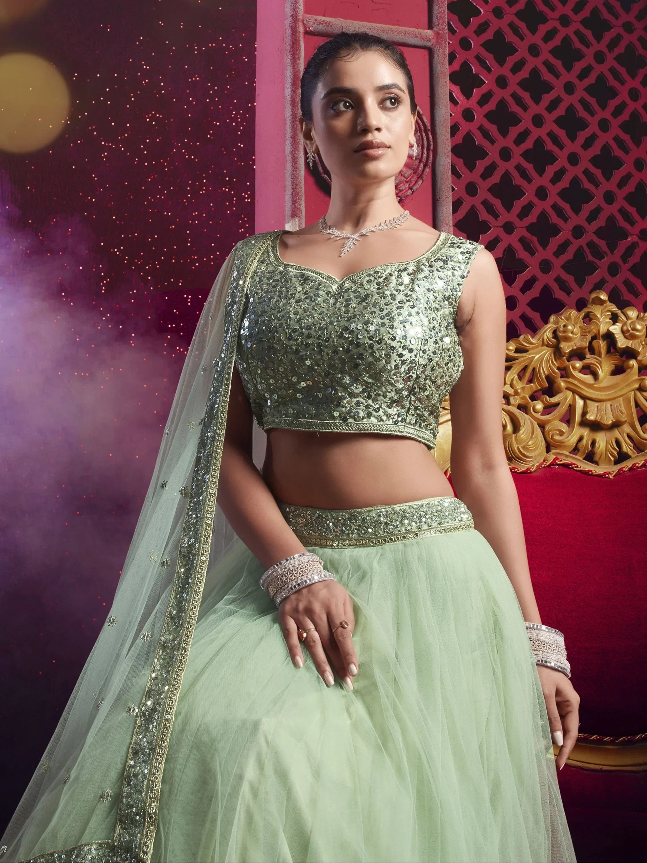 Mint green sequin lehenga choli with sheer dupatta, perfect for Indian ethnic wear events