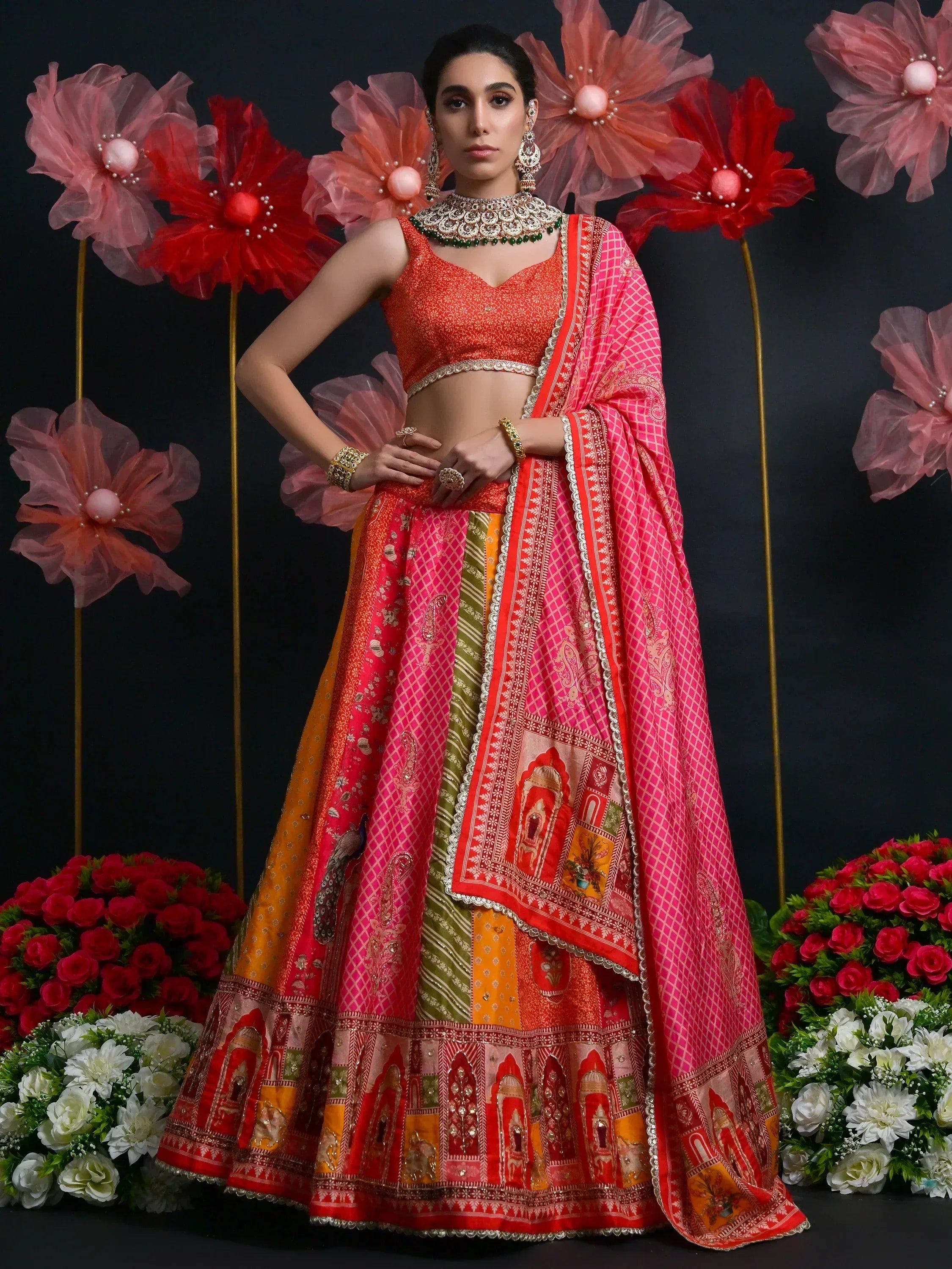 Vibrant Indian lehenga choli with patchwork design, perfect for weddings and festive occasions.
