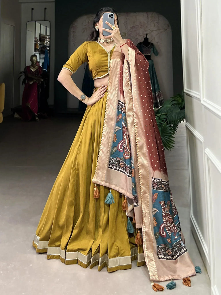 Mustard yellow lehenga choli with printed dupatta, ethnic Indian wear for women