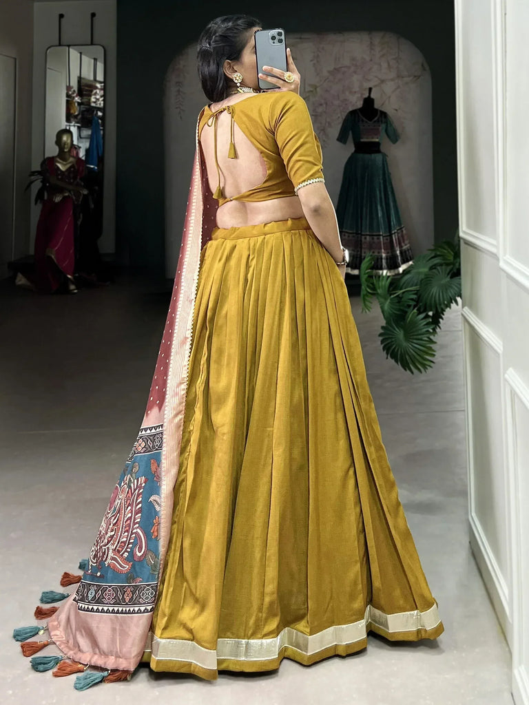 Mustard yellow lehenga choli with back tie blouse and printed dupatta, ethnic Indian wear